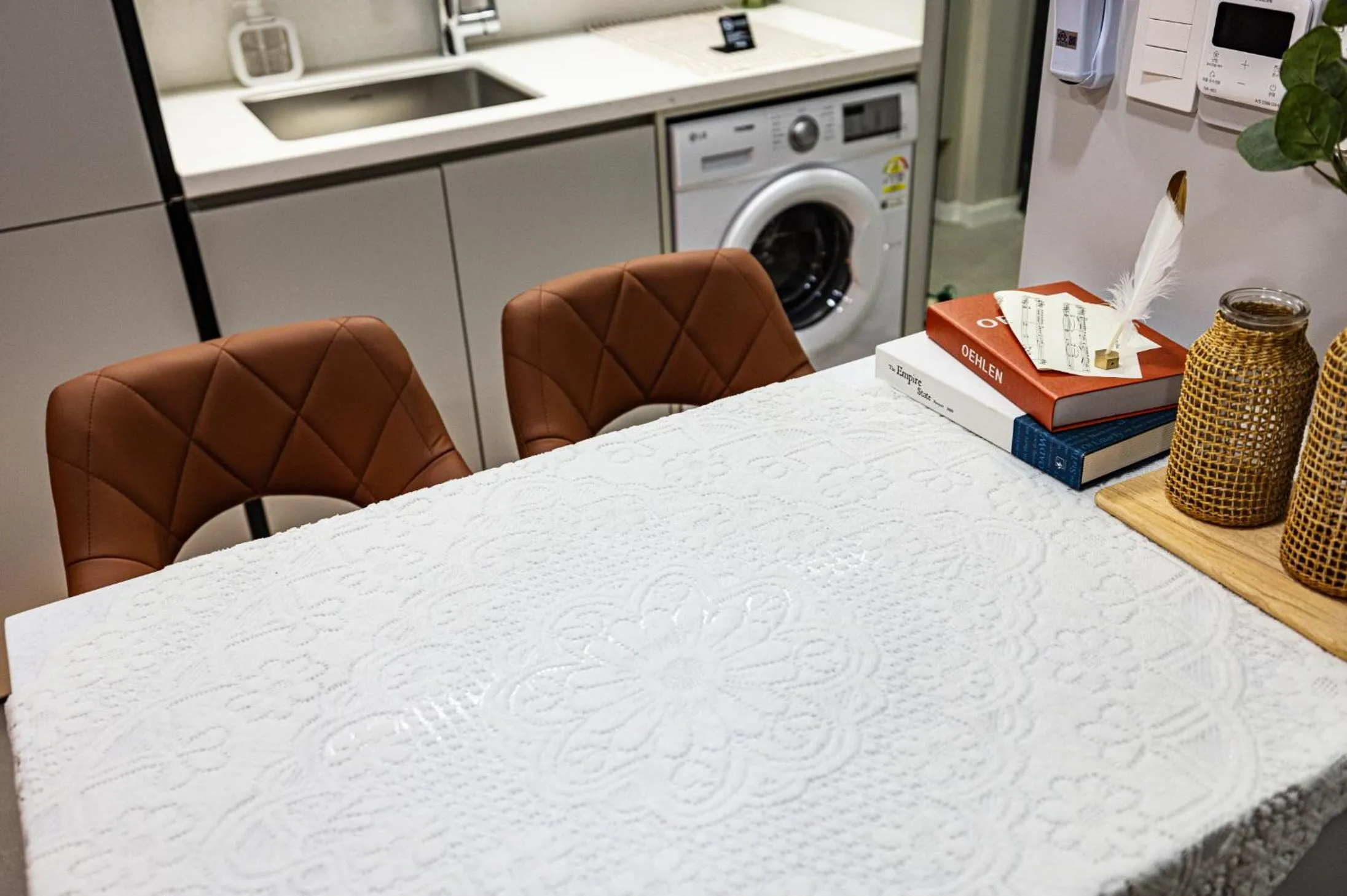 Kitchen or kitchenette in Raviens Haeundae Avenue