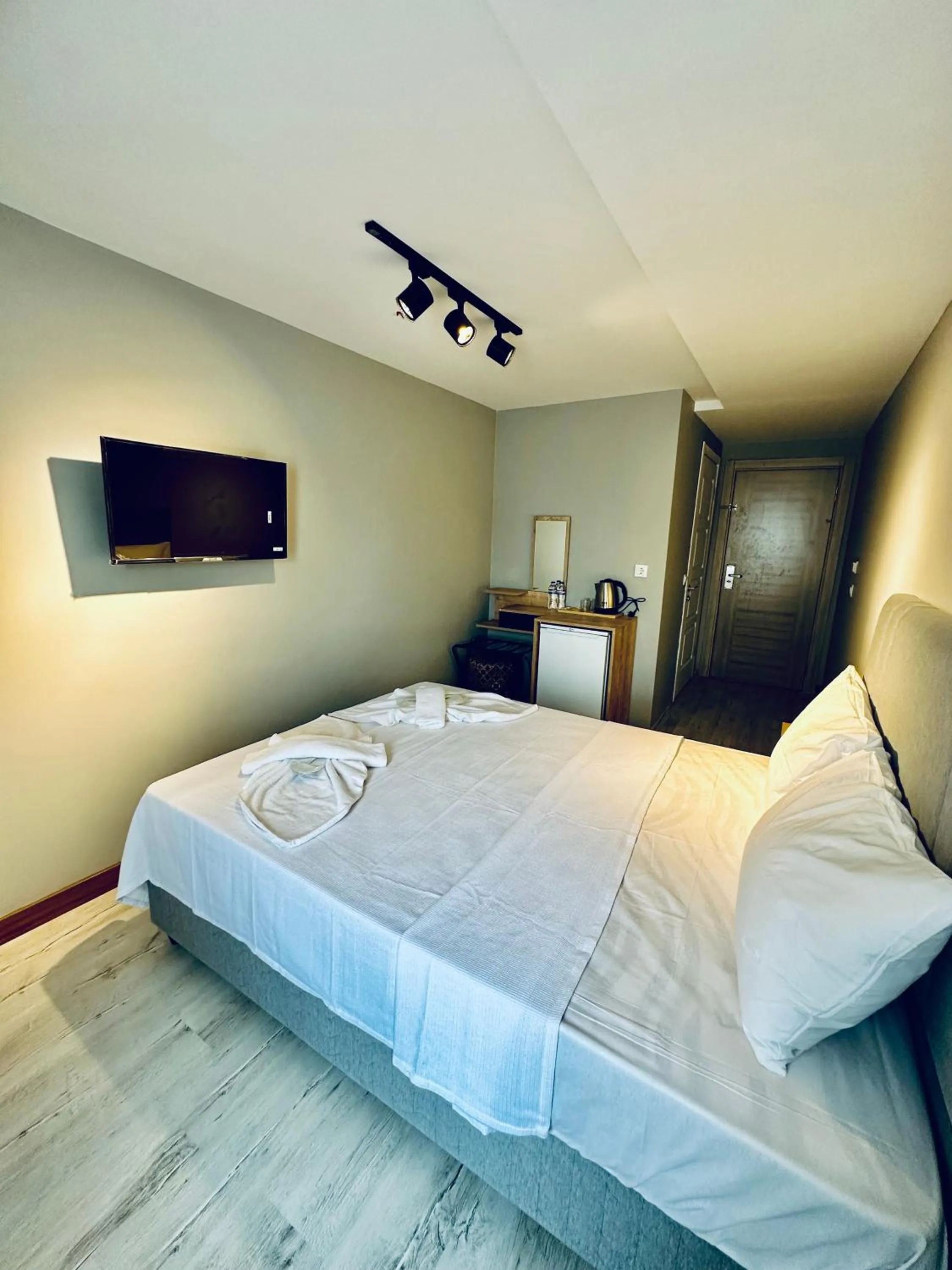 Bed in The Hera Gold Hotel