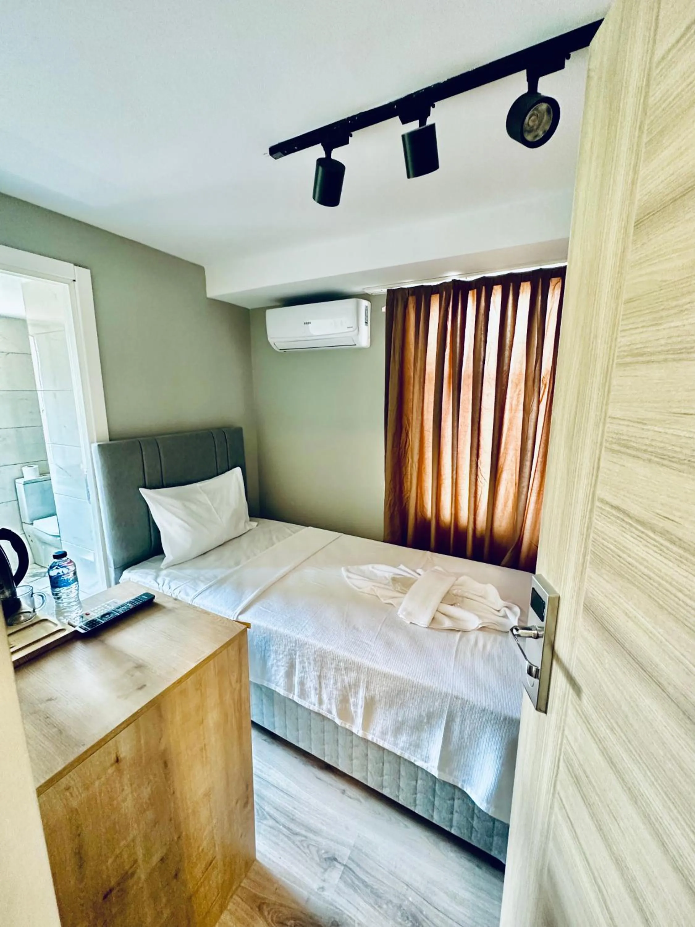 Bed in The Hera Gold Hotel