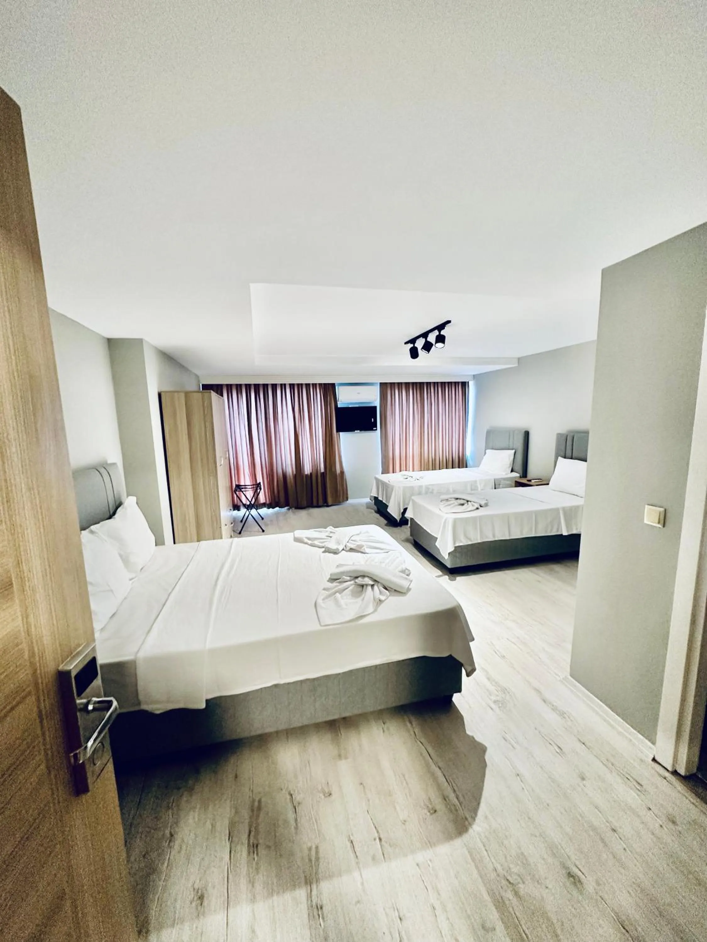 Bed in The Hera Gold Hotel