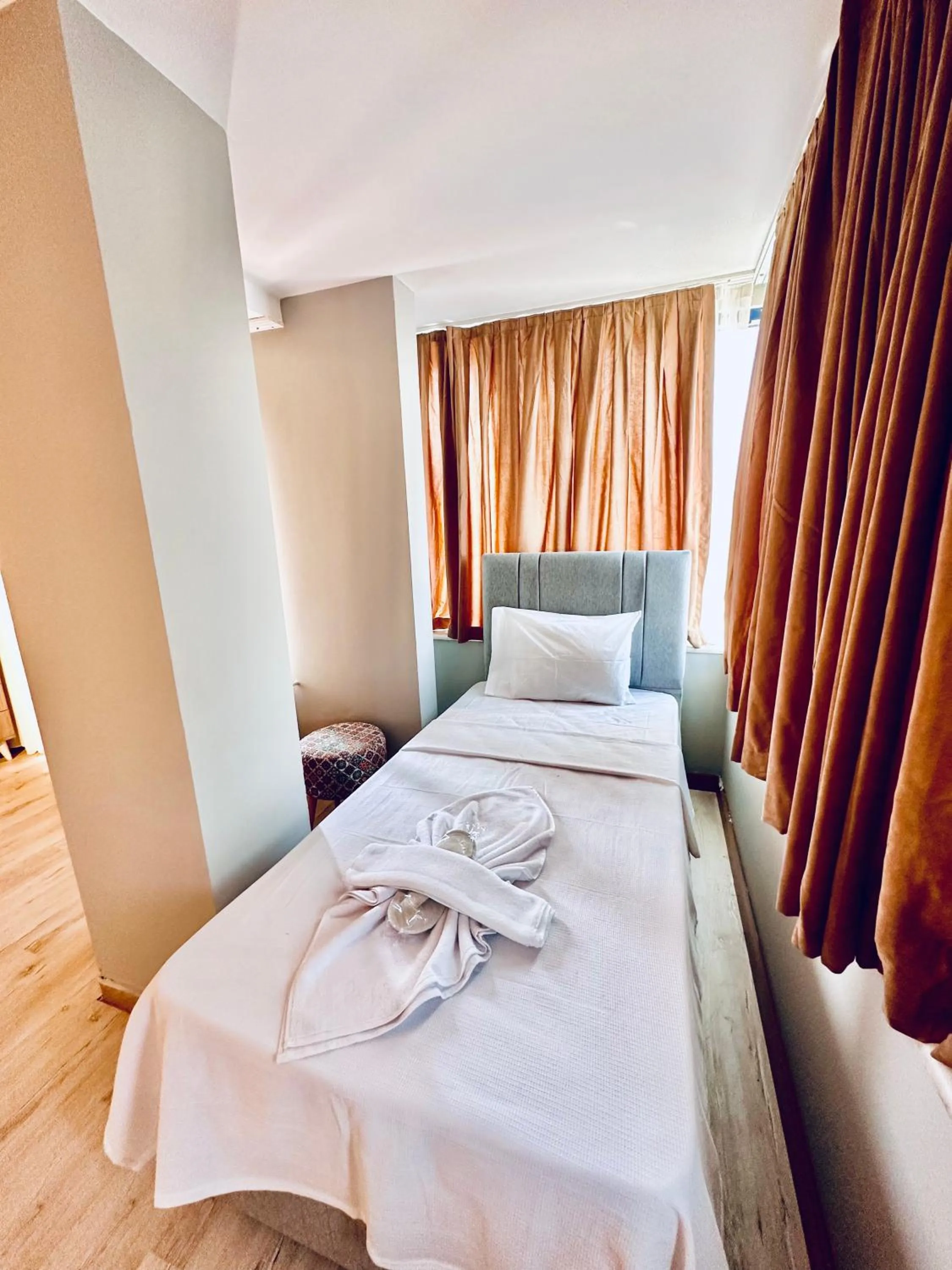 Bed in The Hera Gold Hotel