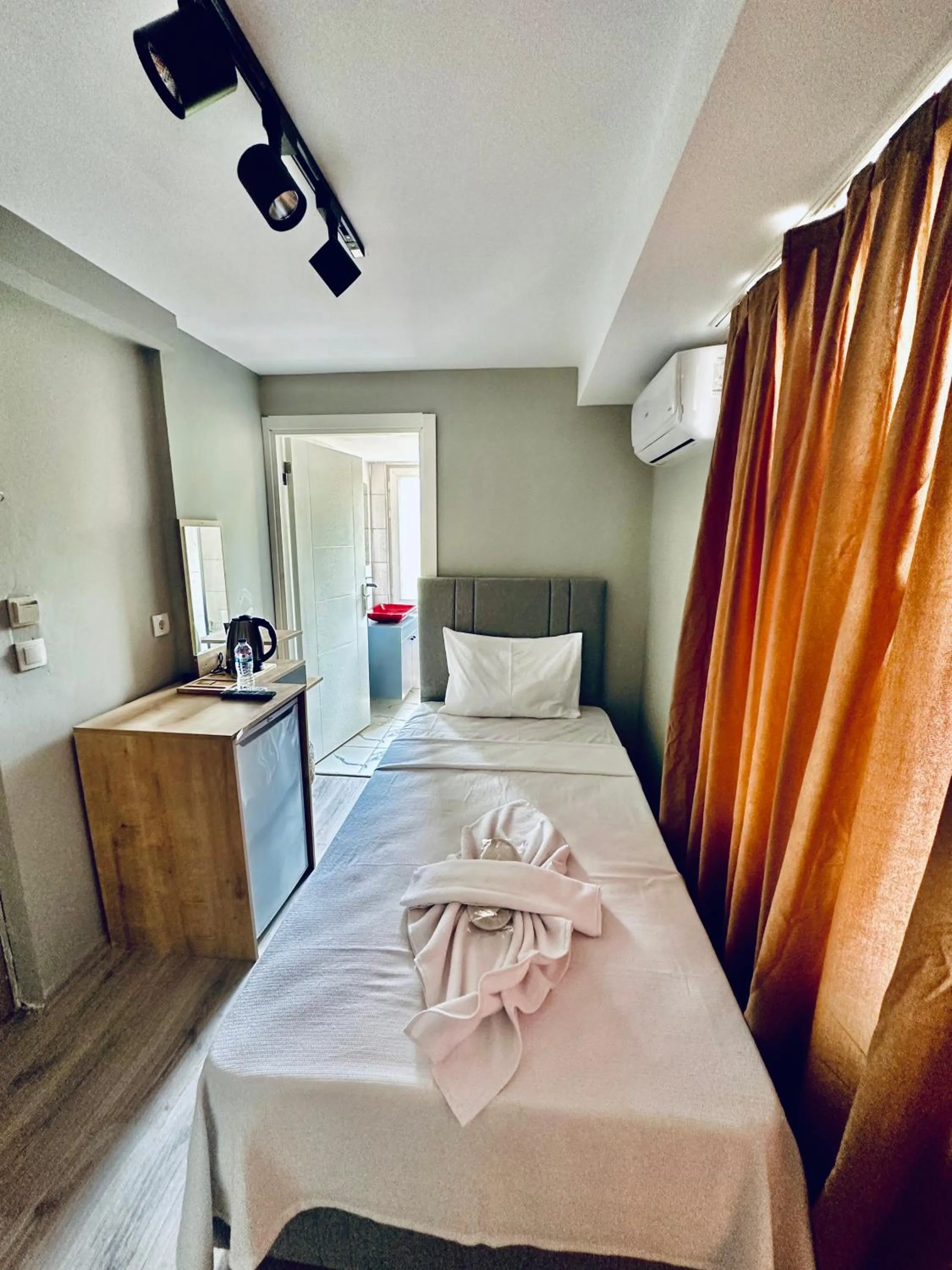 Bed in The Hera Gold Hotel