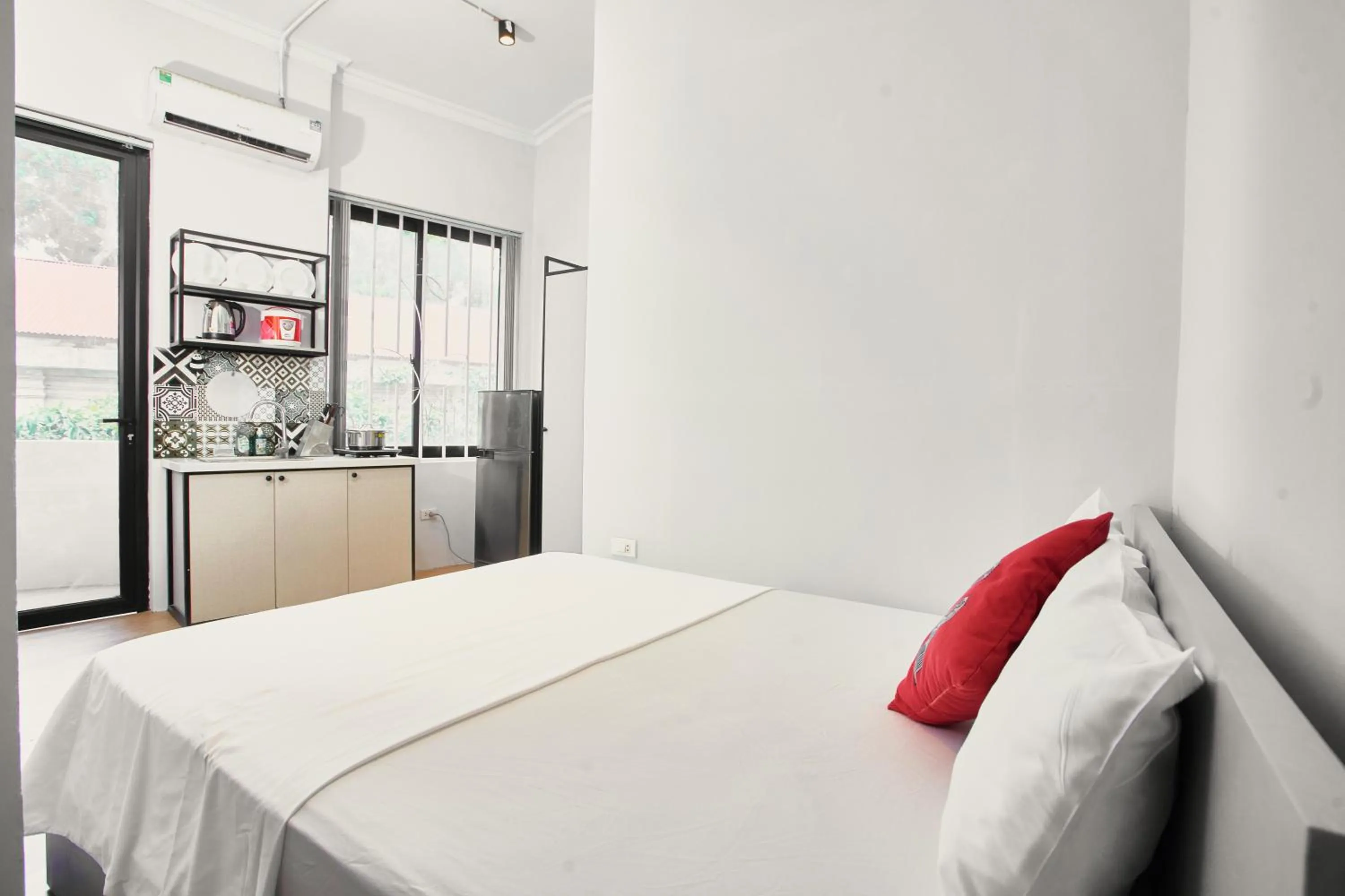 Bed in Eco Nest Hotel & Apartment