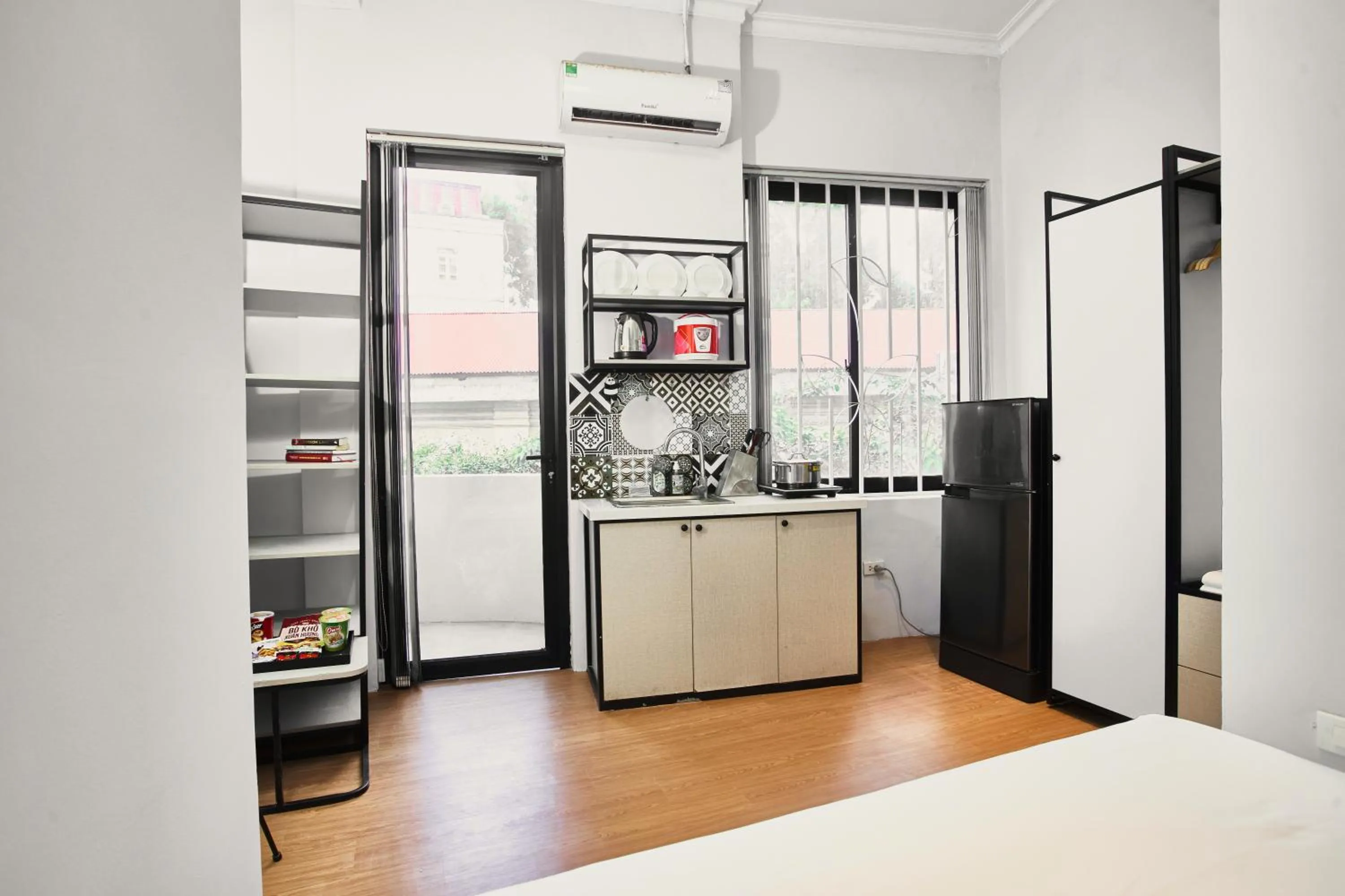 Kitchen or kitchenette, Bed in Eco Nest Hotel & Apartment