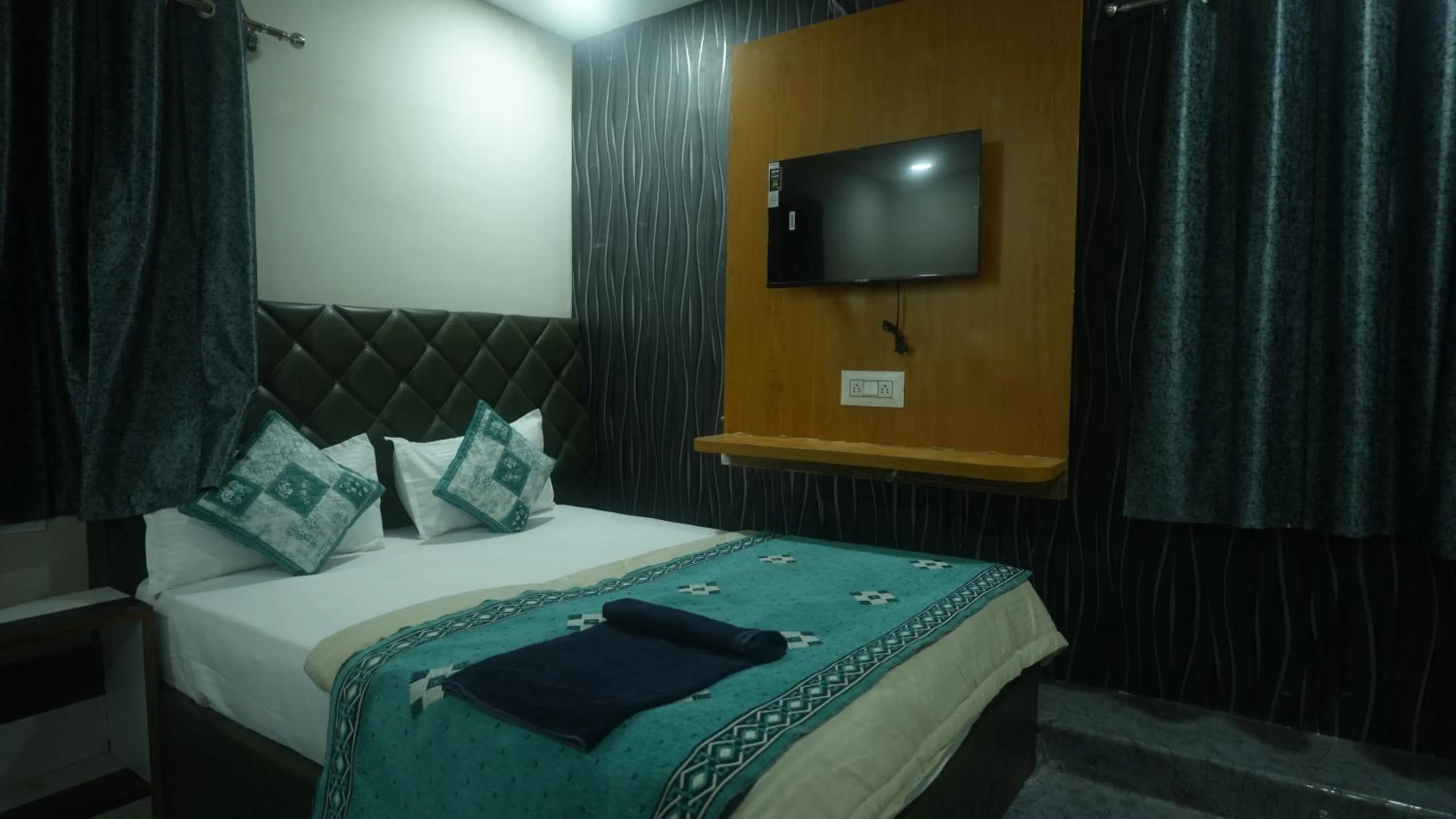 Bed in Hotel Mahakal Avantika Palace