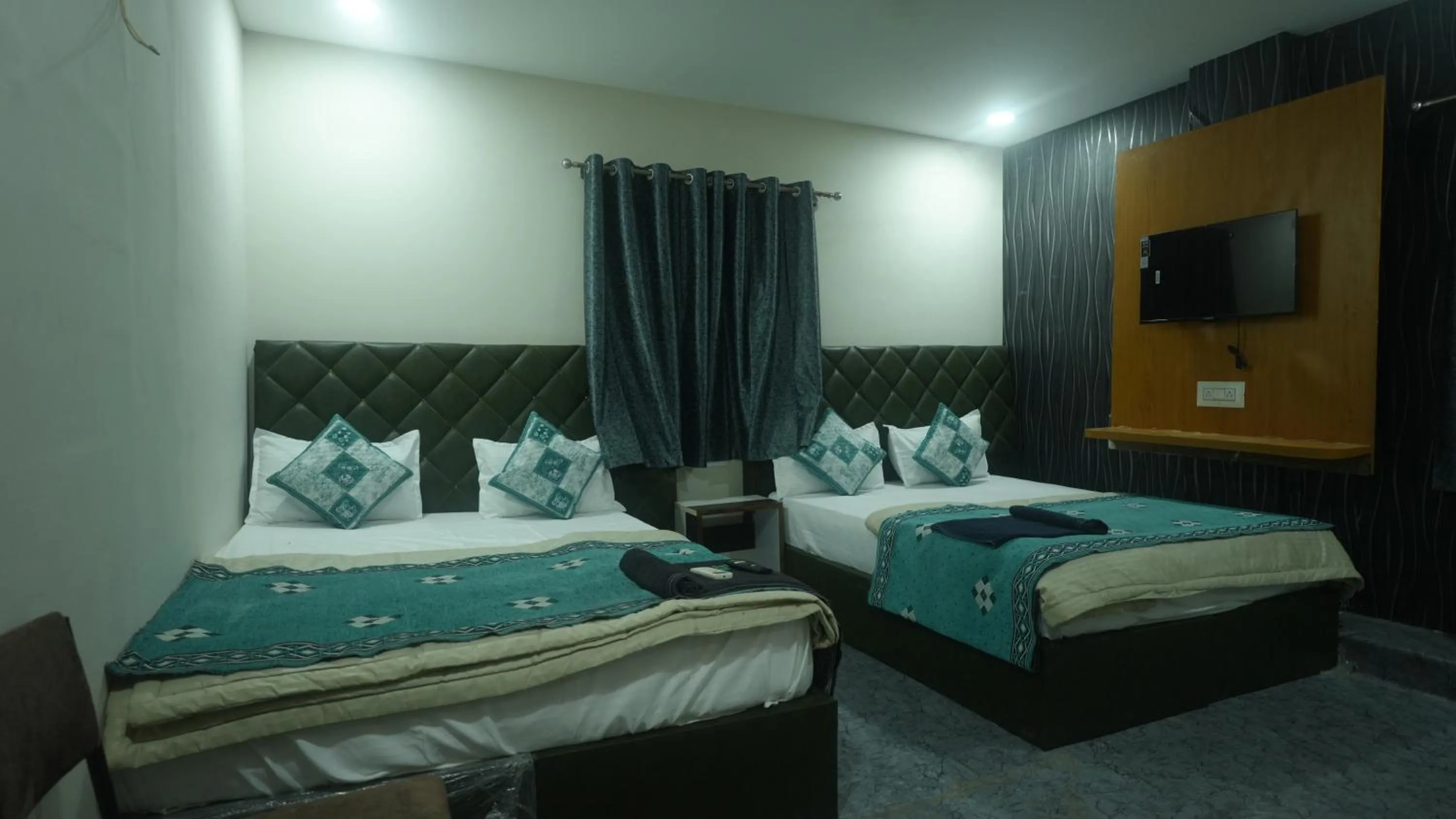 Bed in Hotel Mahakal Avantika Palace