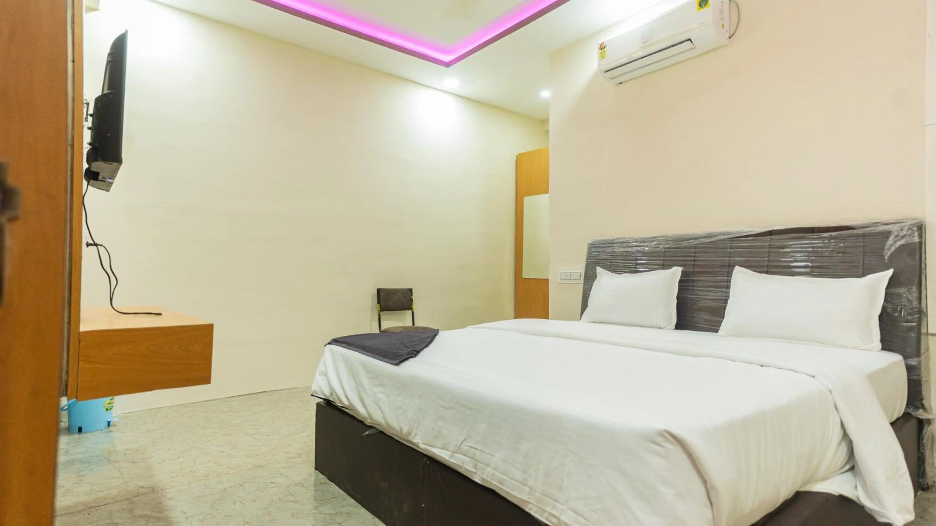 Bed in Hotel Mahakal Avantika Palace