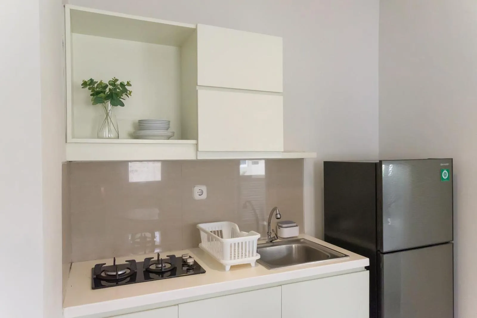 Kitchen or kitchenette in Mono Coliving at BSD City