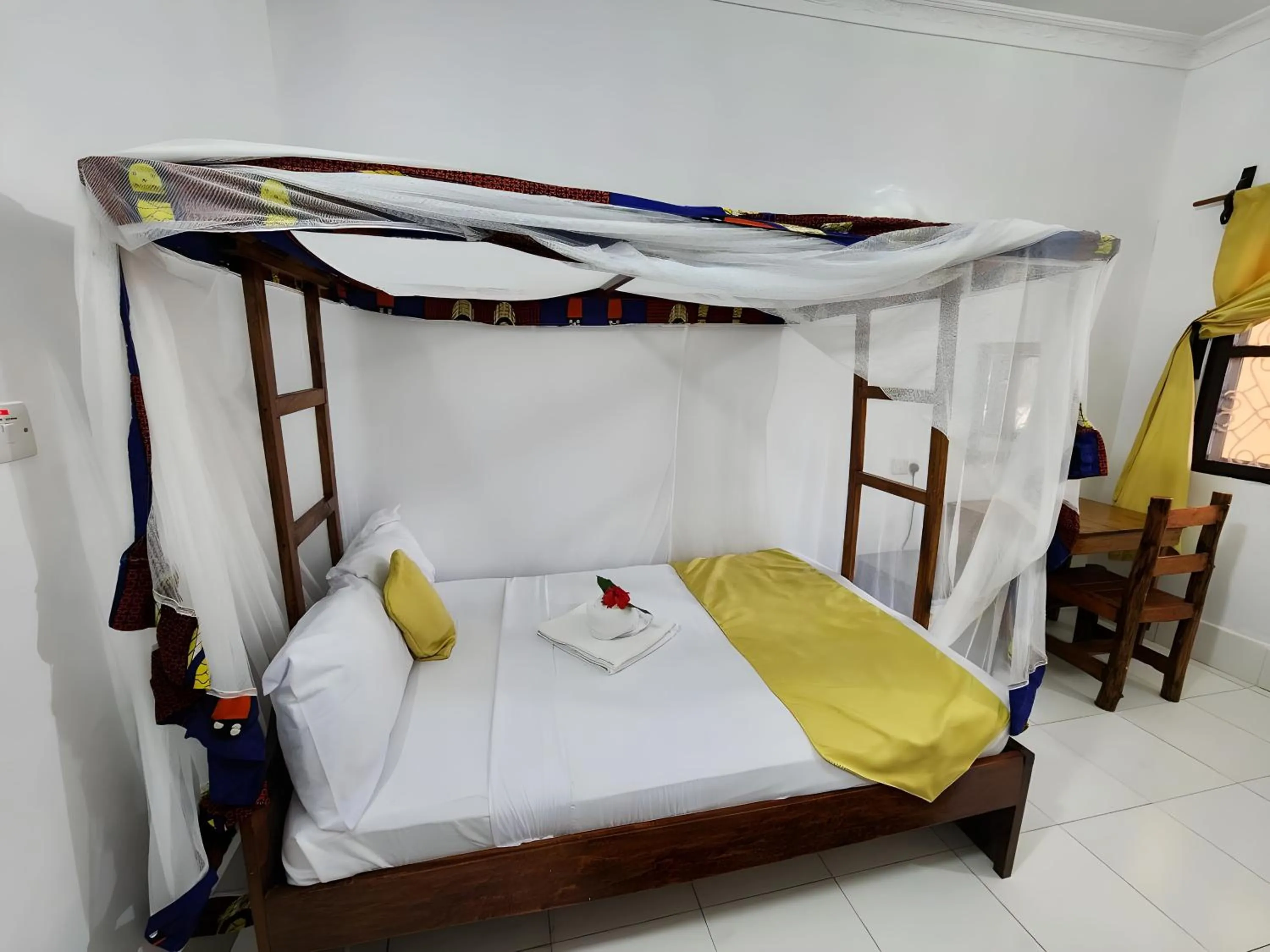 Bed in Seagull Nungwi Resort