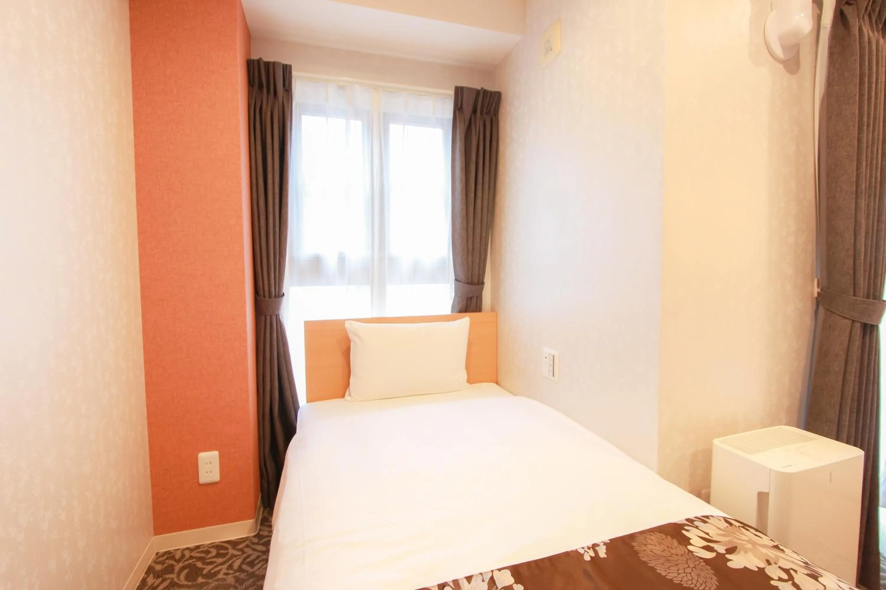 Bed in Grand Prime HAKATA HOTEL