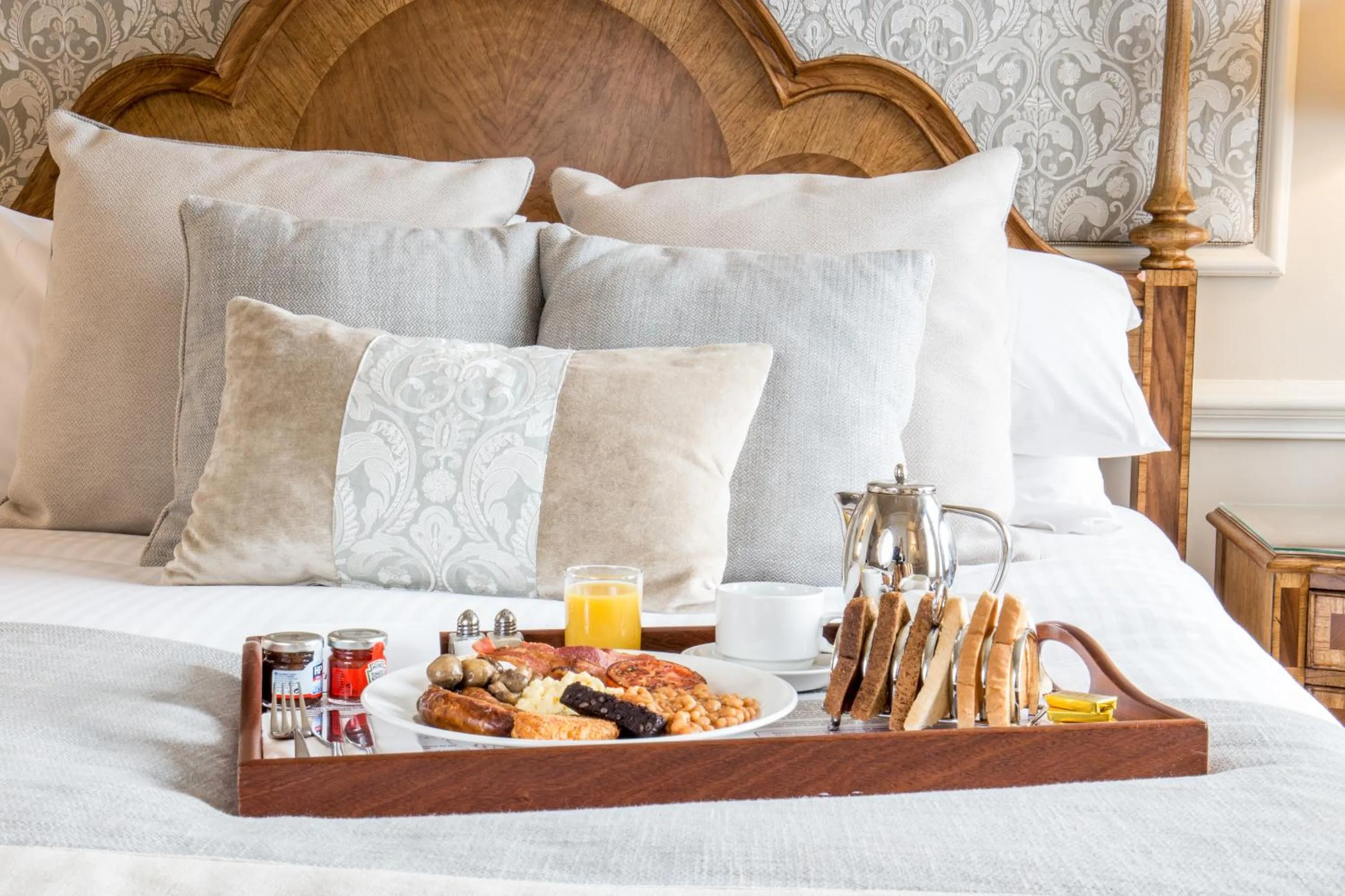 Bed in Down Hall Hotel