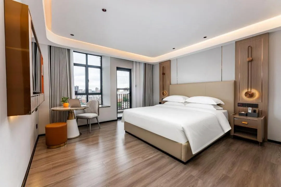 Bed in Poltton International Apartment - Foshan Gaoming Yingxin Plaza
