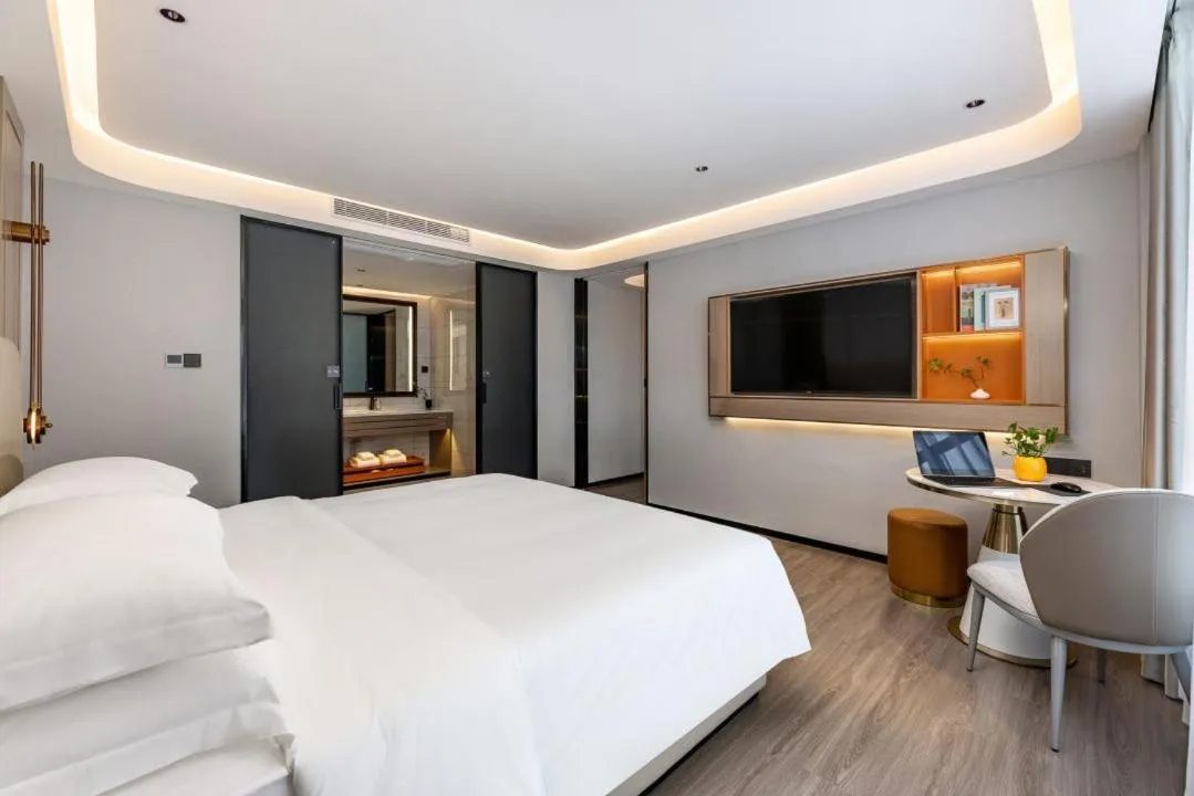 Bed in Poltton International Apartment - Foshan Gaoming Yingxin Plaza