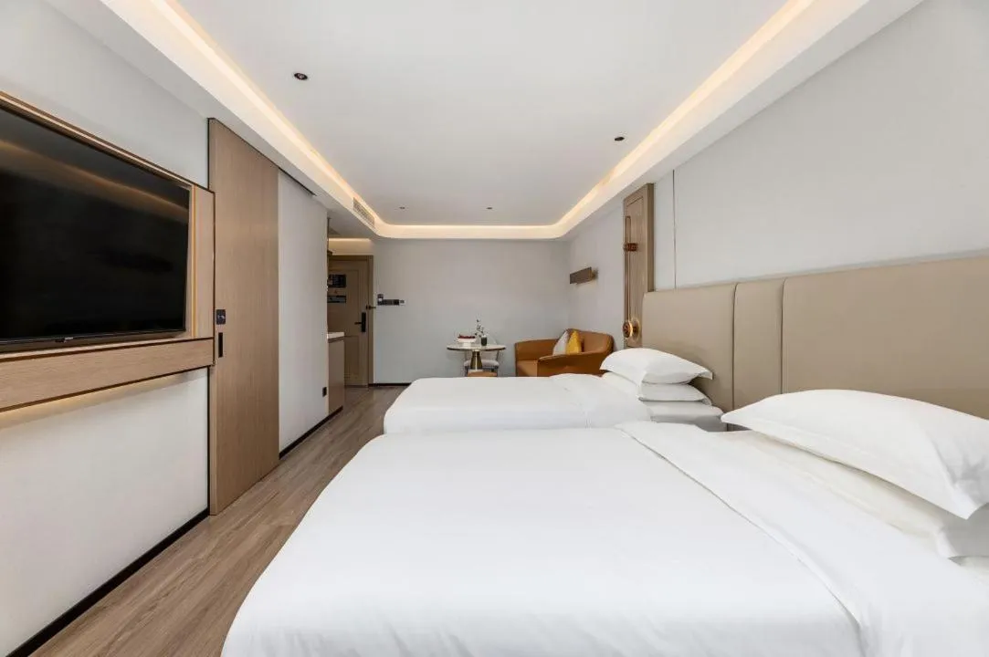 Bed in Poltton International Apartment - Foshan Gaoming Yingxin Plaza