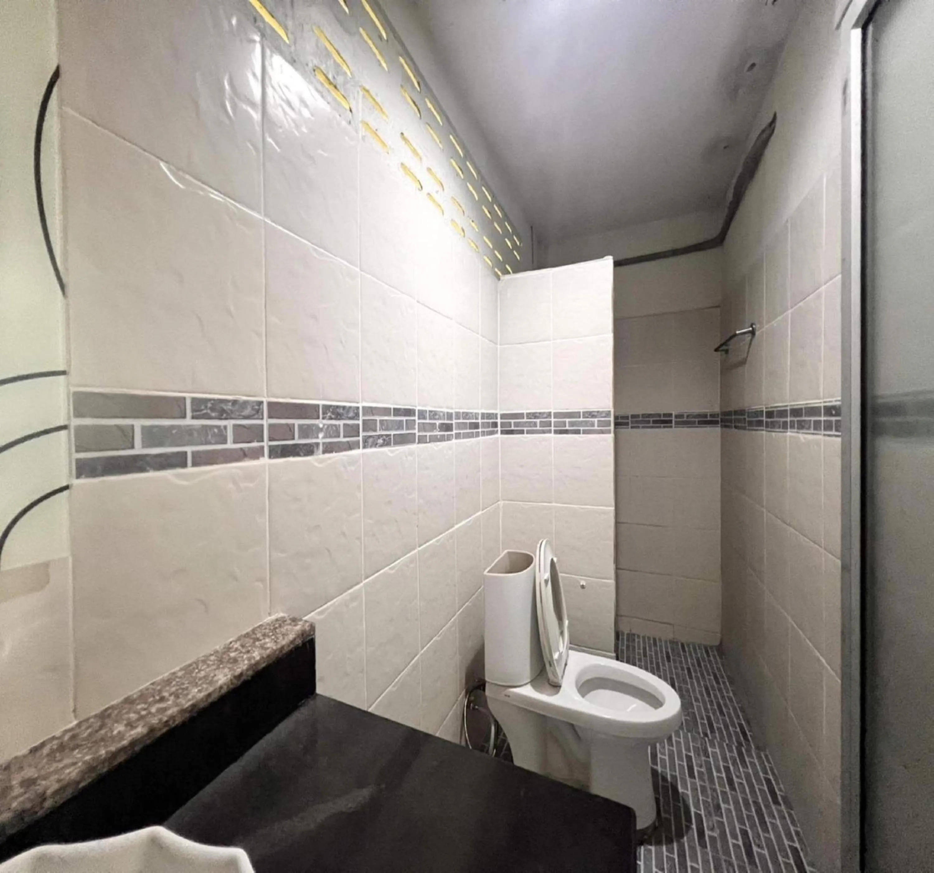 Bathroom in OYO 75517 Mananchaya Resort