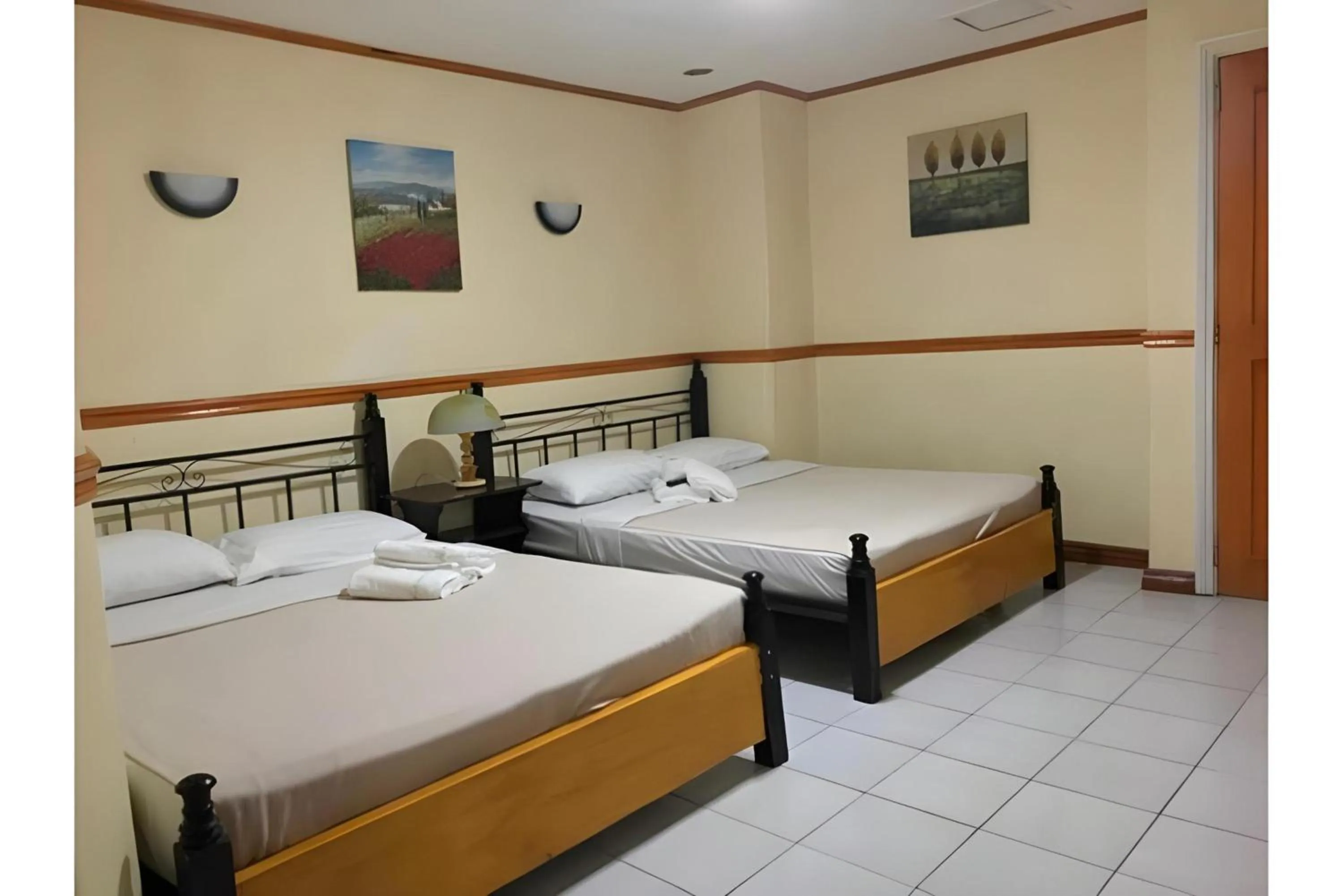 Photo of the whole room, Bed in Marian Kisad Hotel