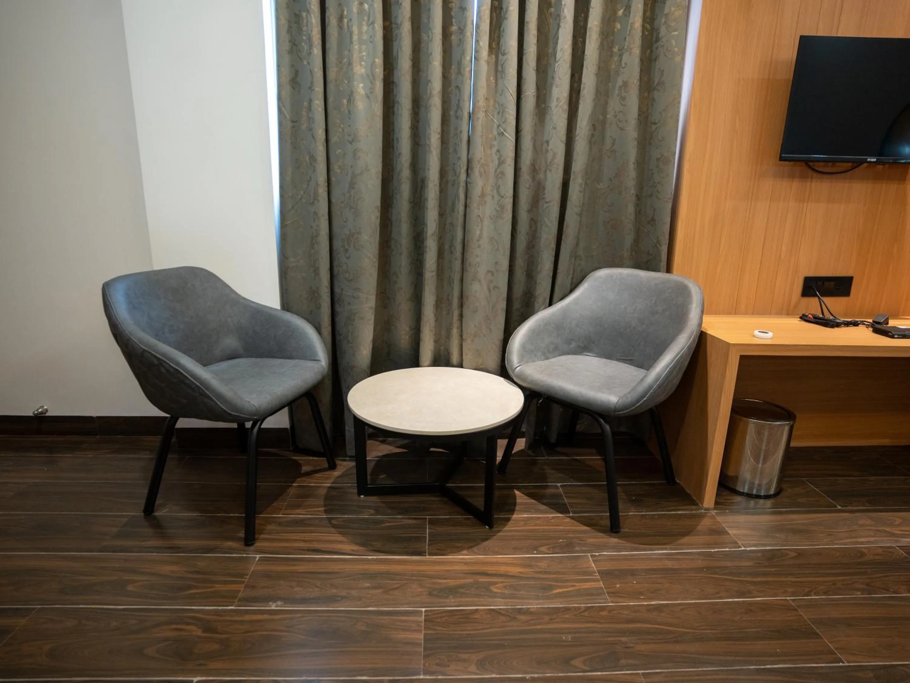 Seating area in Pravasa Stay Near Luv Kush Square