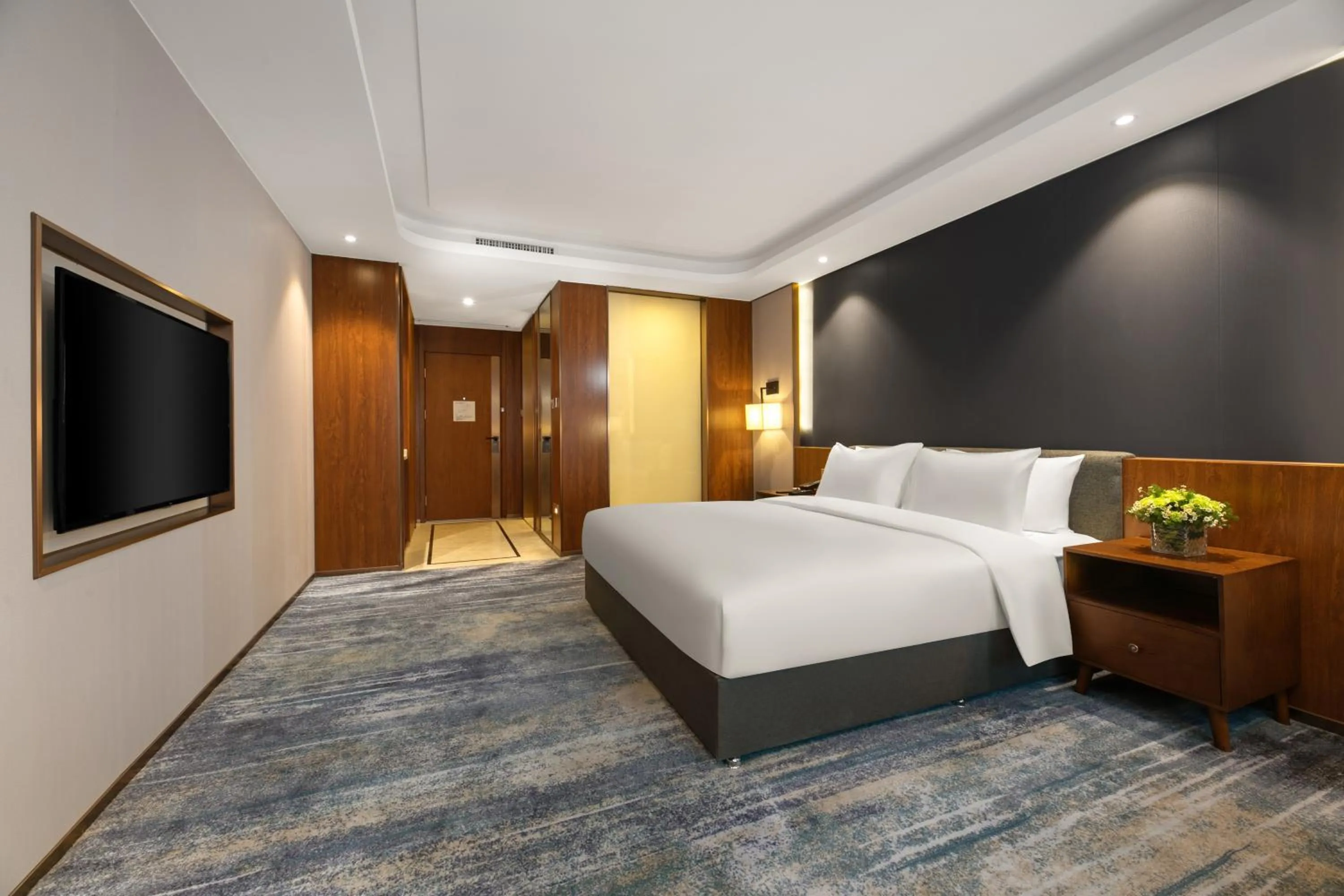 Bed in Furunde Wanda Jin Hotel