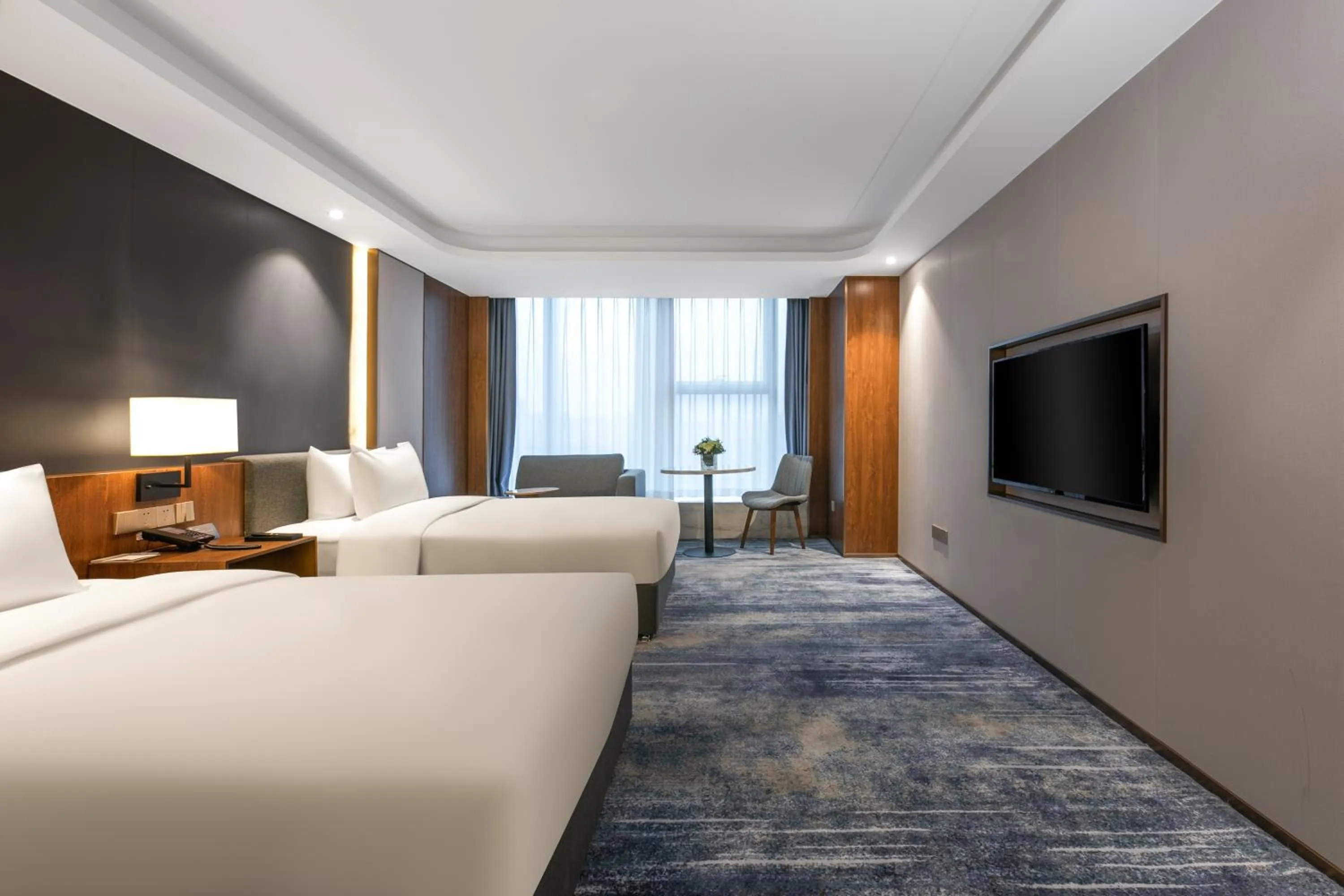 Bed in Furunde Wanda Jin Hotel