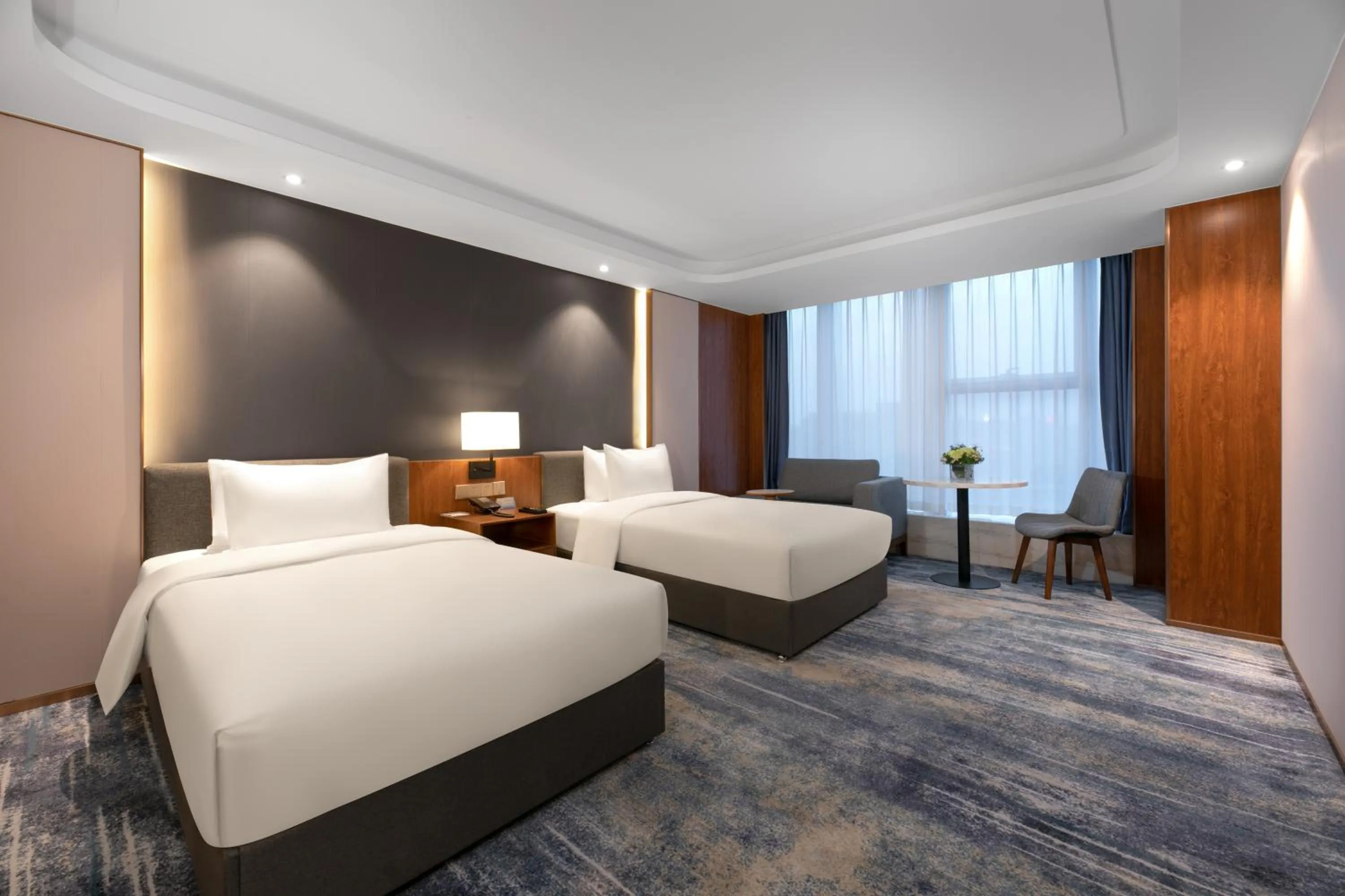 Bed in Furunde Wanda Jin Hotel