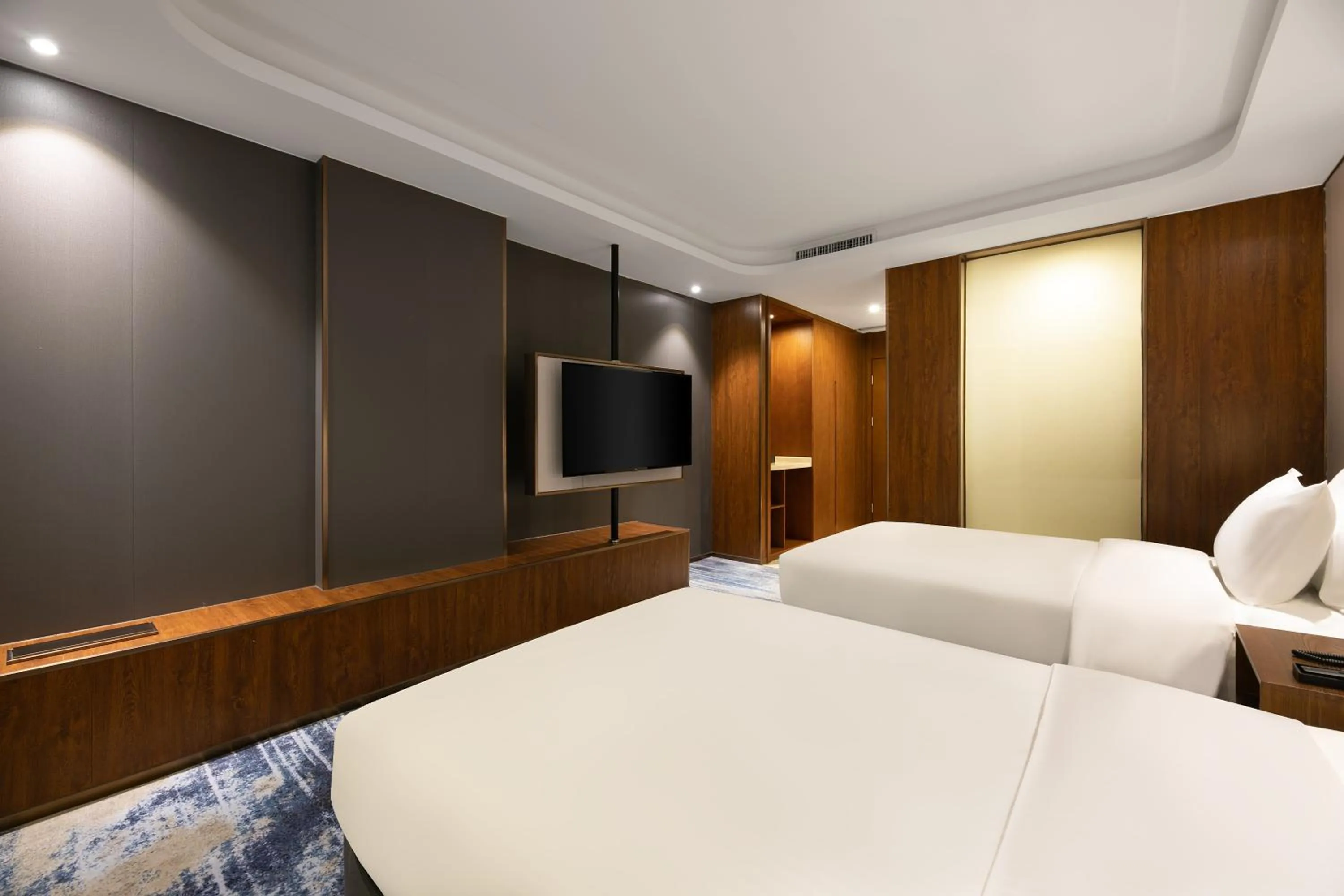 Bed in Furunde Wanda Jin Hotel