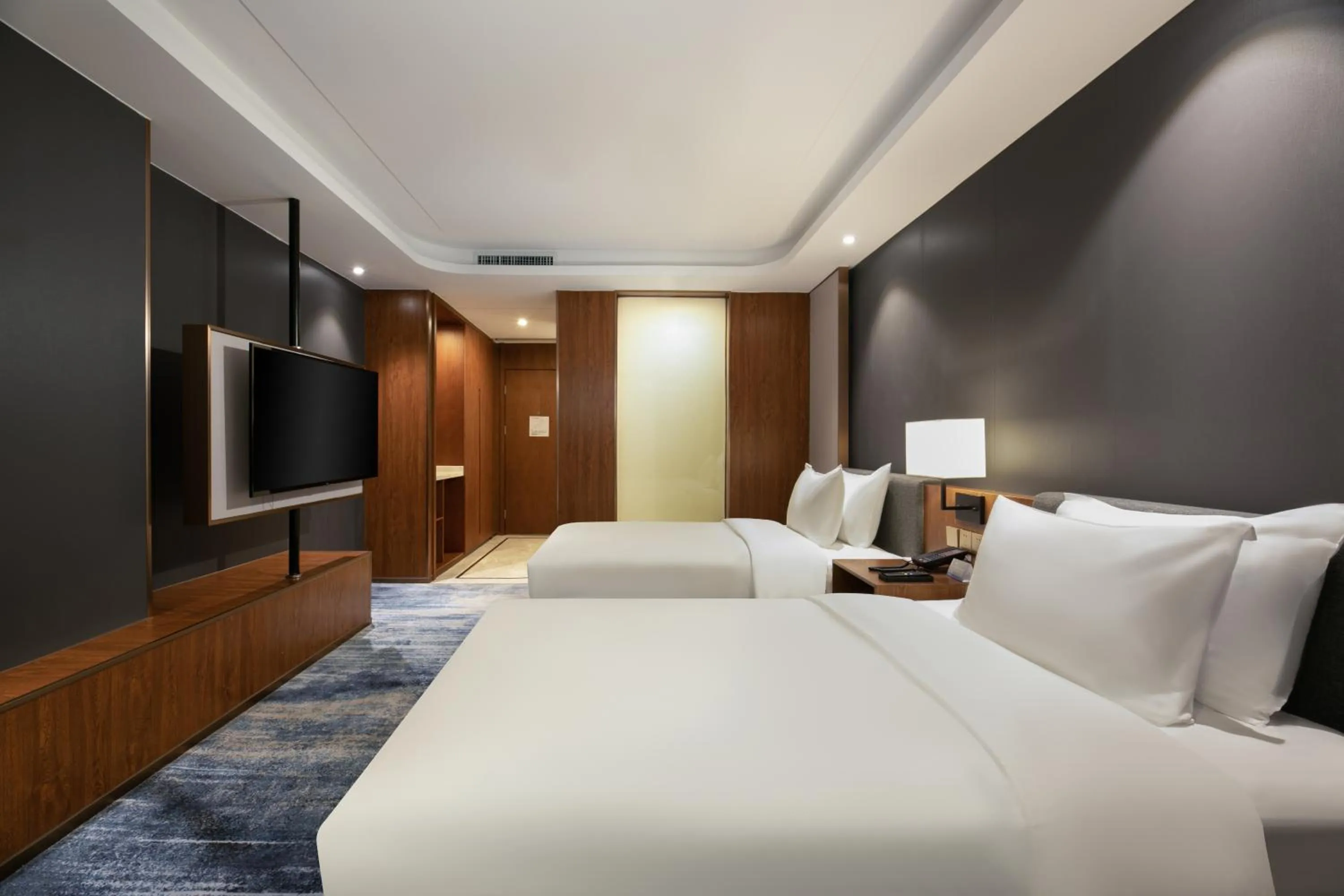 Bed in Furunde Wanda Jin Hotel