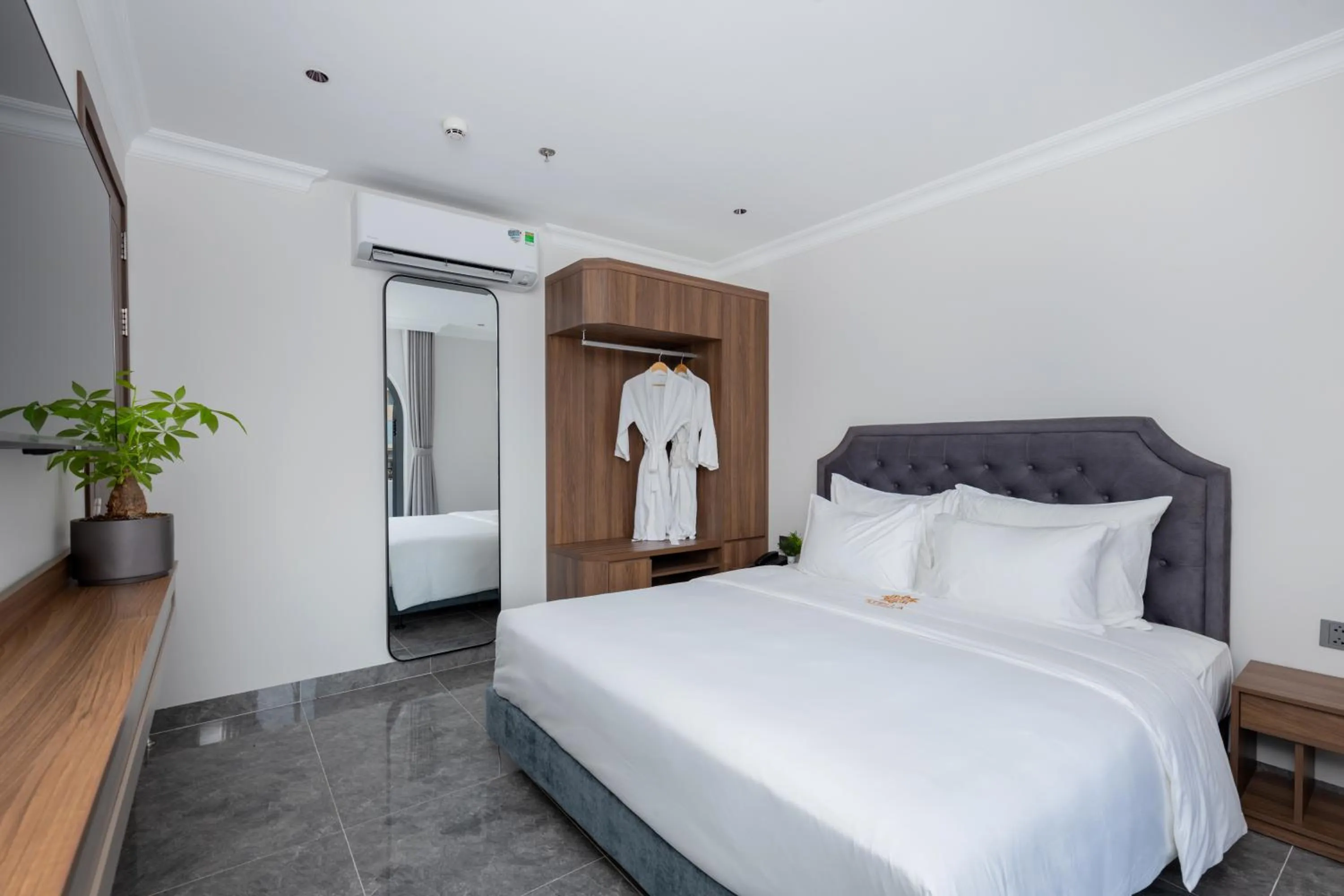 Bed in STELLA Hotel & Apartment