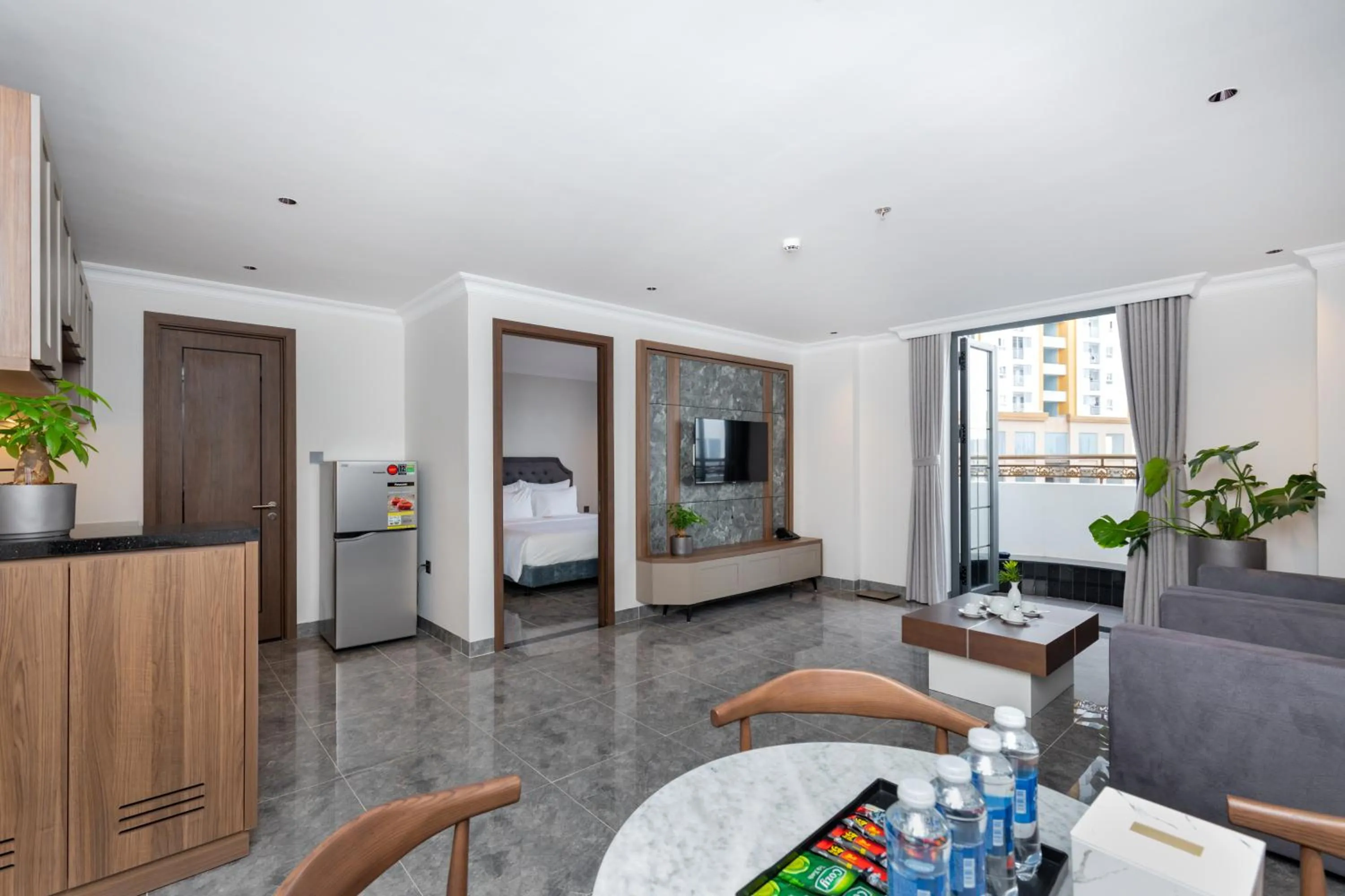 Living room, Bed in STELLA Hotel & Apartment