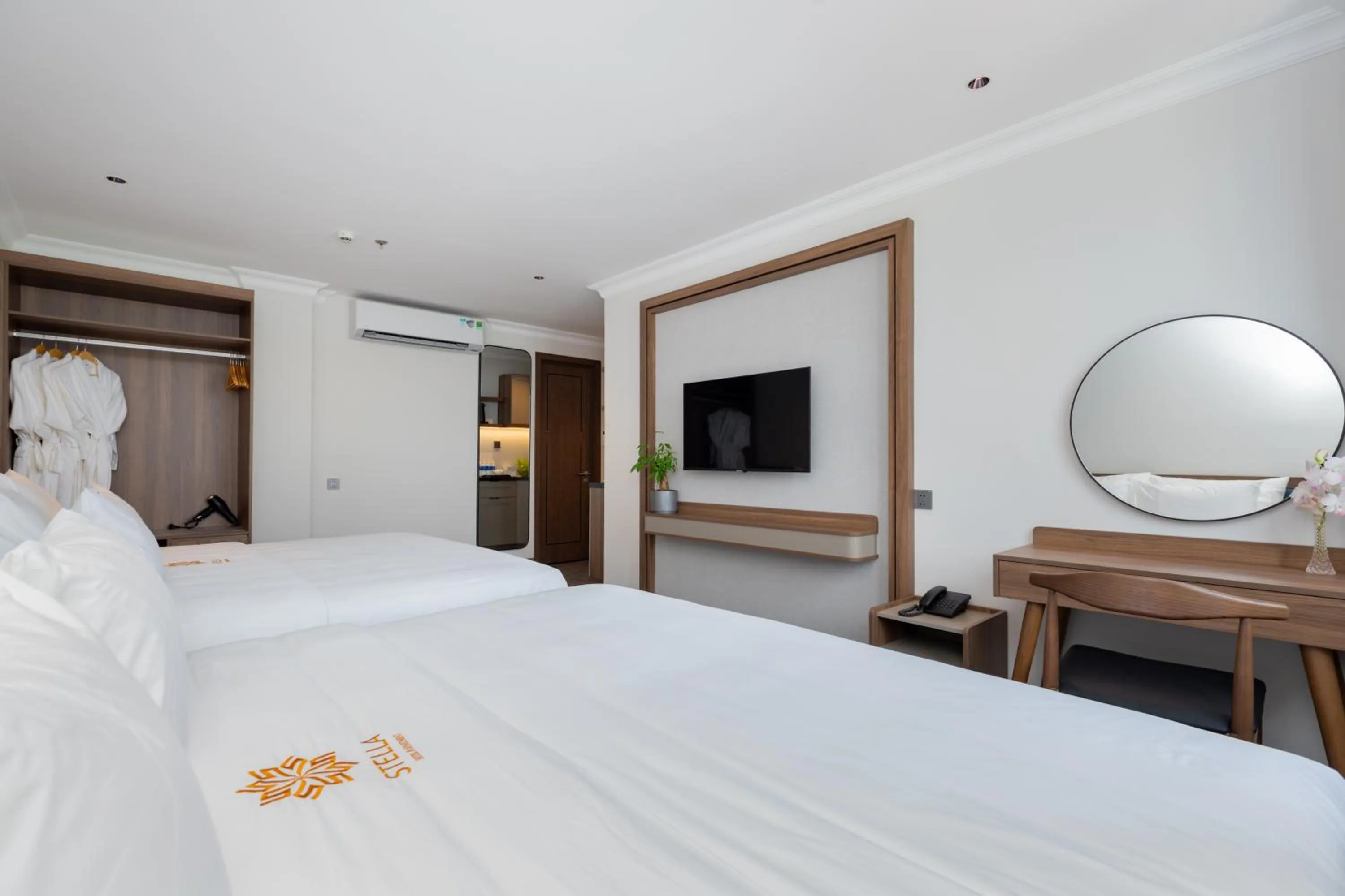 Photo of the whole room, Bed in STELLA Hotel & Apartment