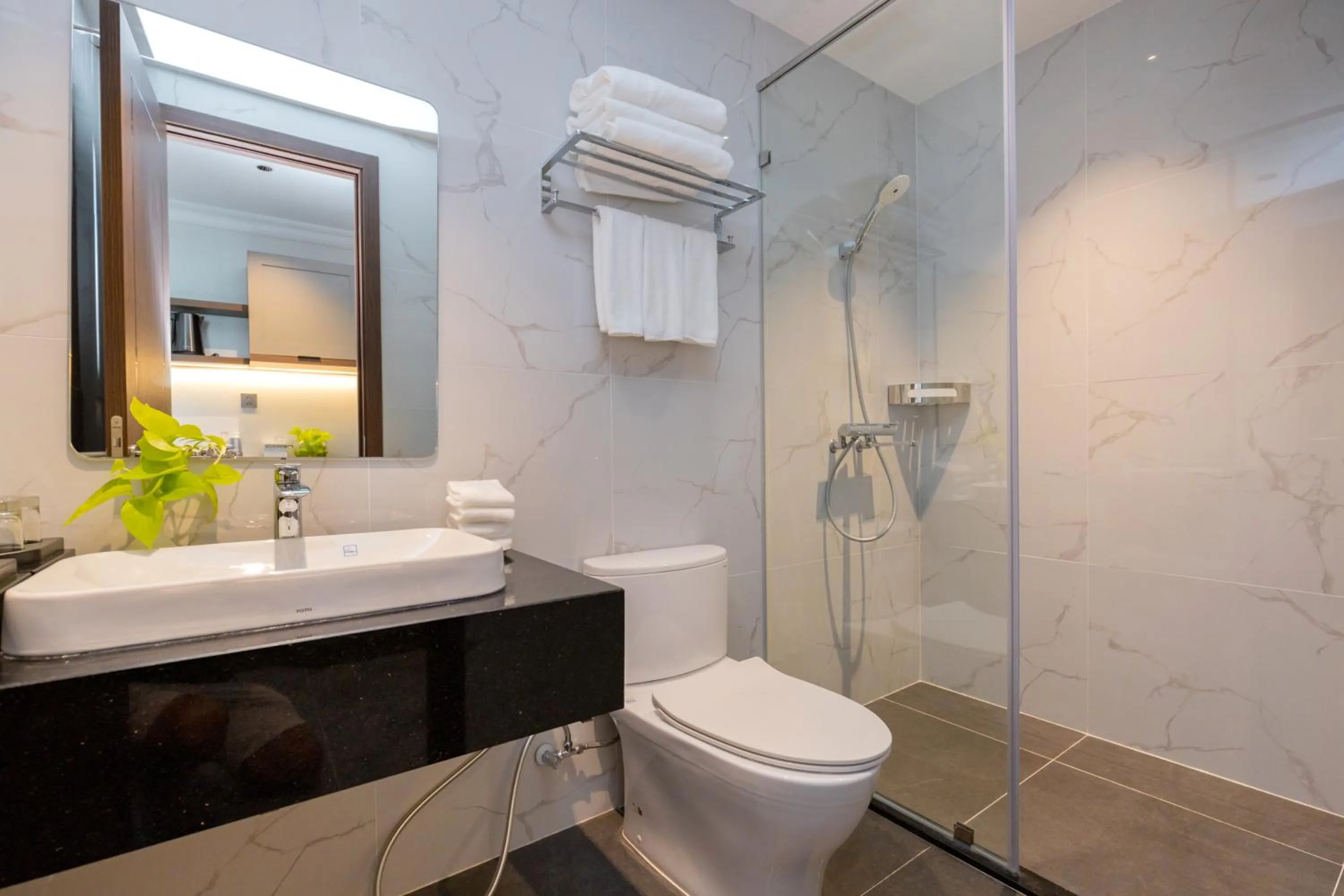 Shower in STELLA Hotel & Apartment