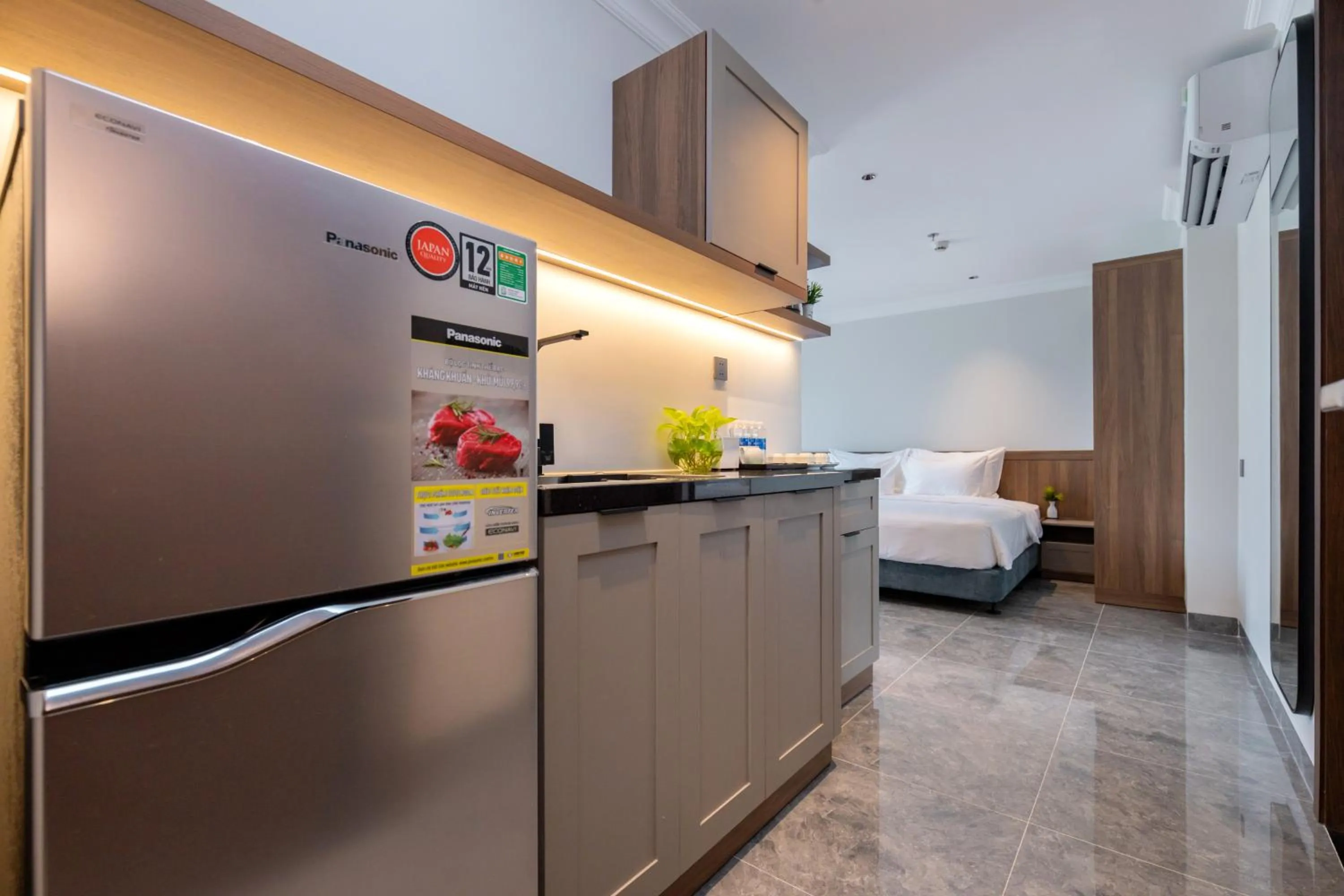 Kitchen or kitchenette in STELLA Hotel & Apartment