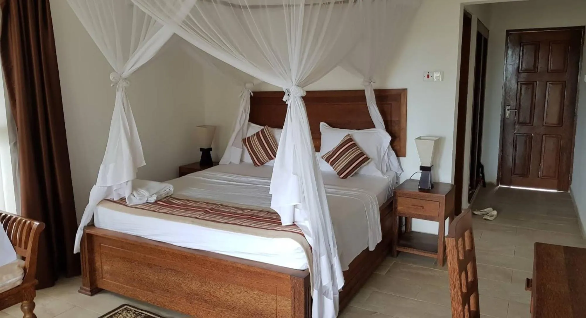 Bed in Zanzibar Bahari Villas