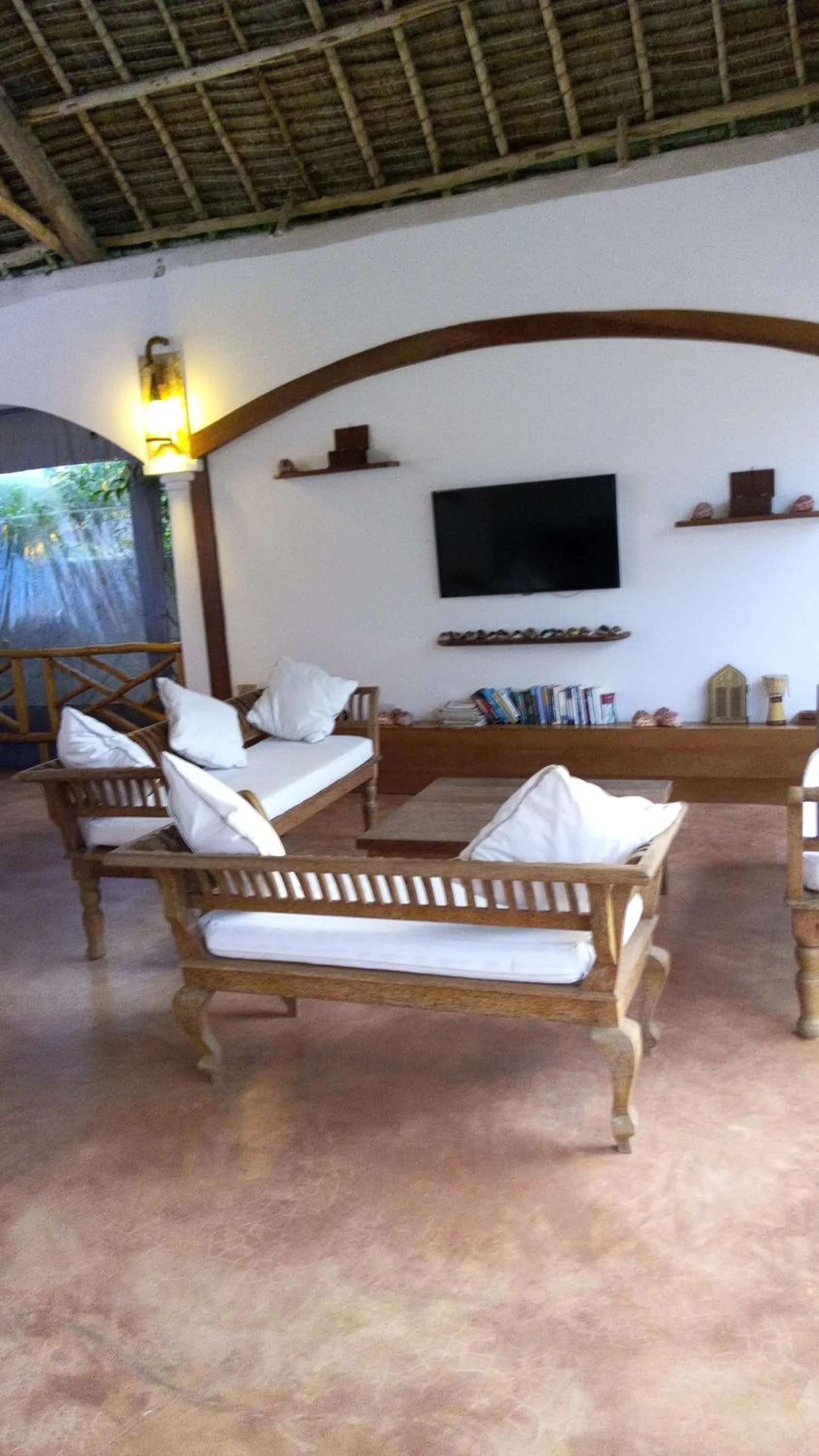 Communal lounge/ TV room in Zanzibar Bahari Villas