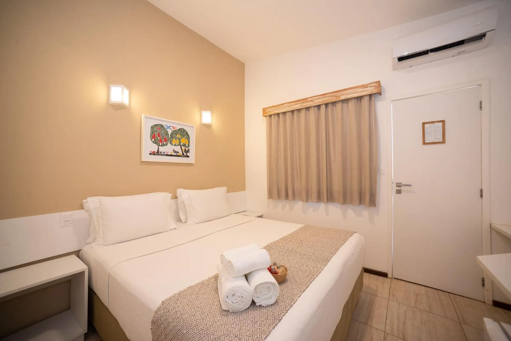 Bed in Pousada Malibu