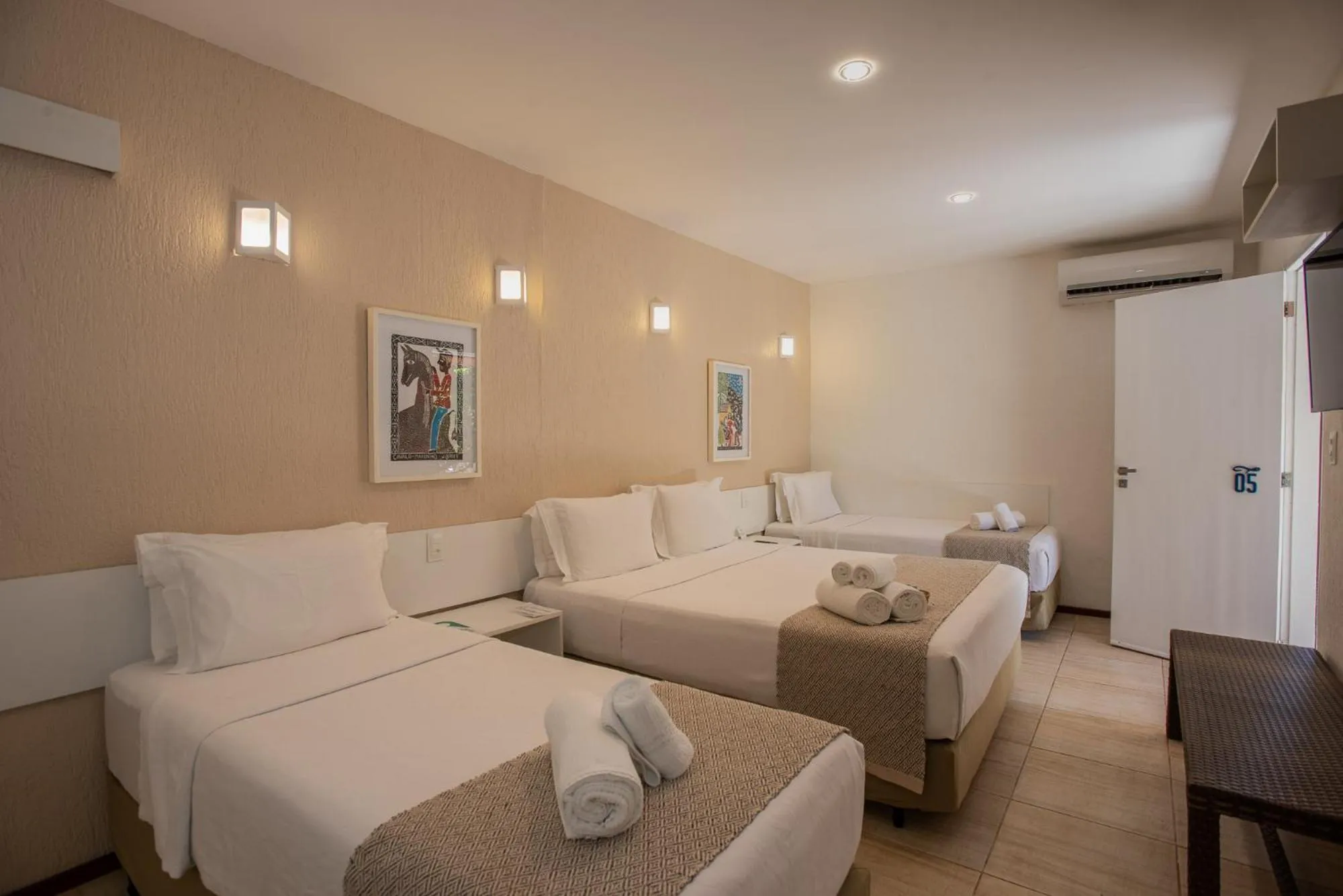 Bed in Pousada Malibu