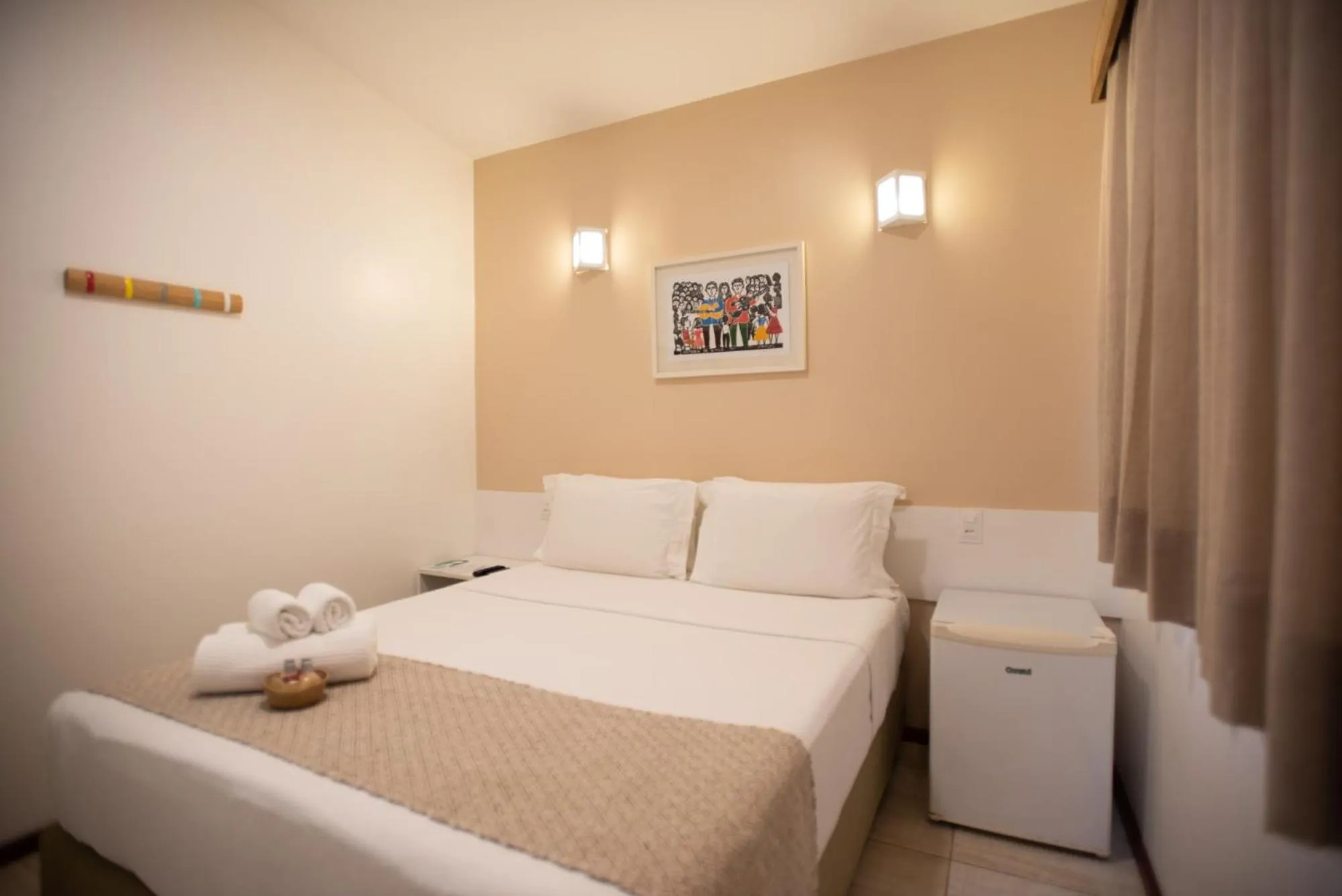 Bed in Pousada Malibu