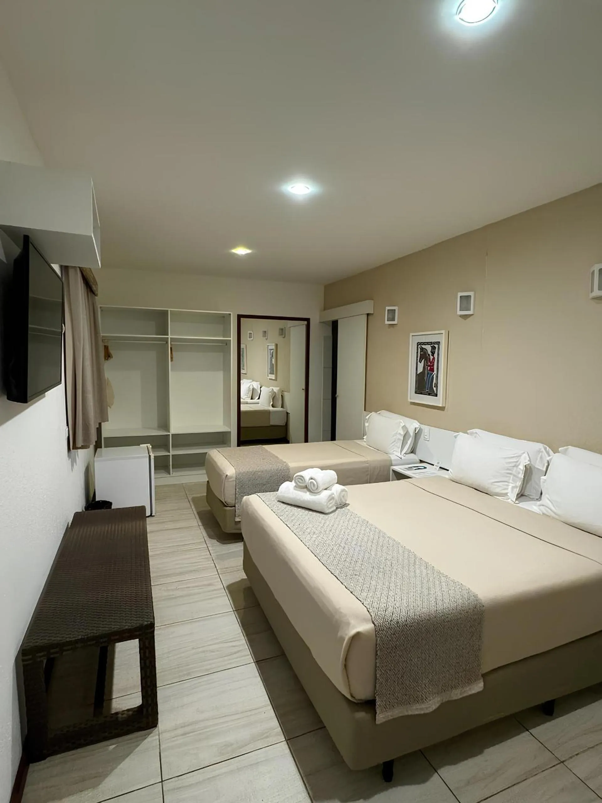 Bed in Pousada Malibu