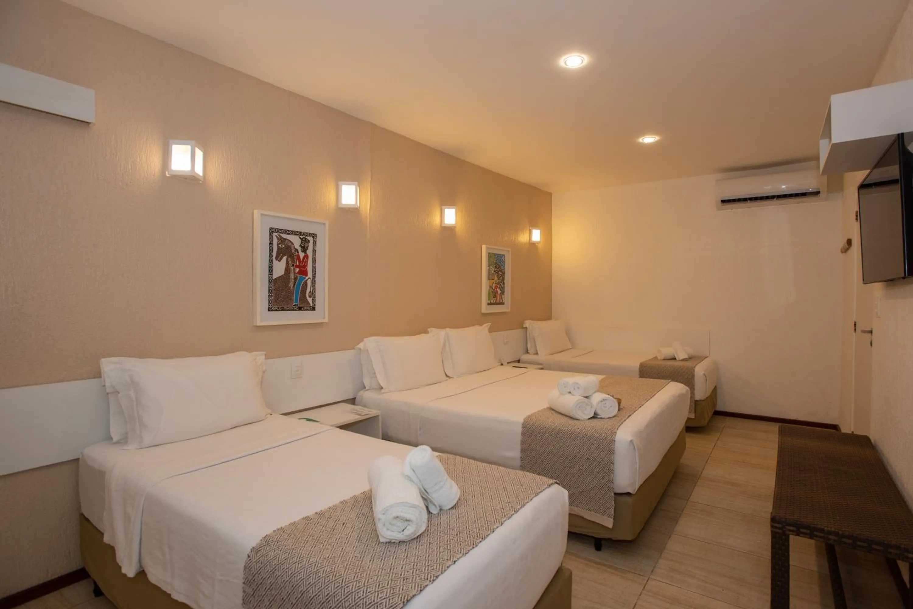 Bed in Pousada Malibu