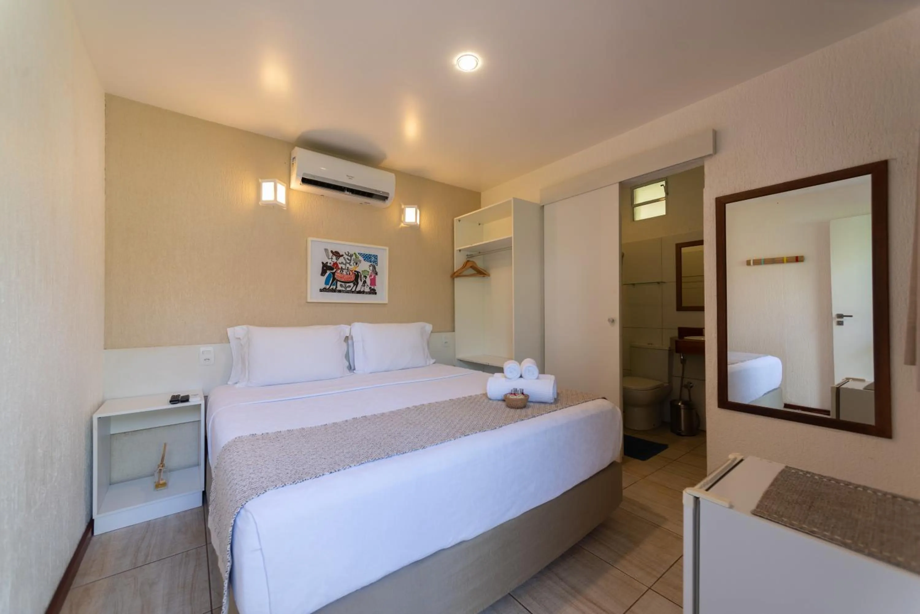 Bed in Pousada Malibu