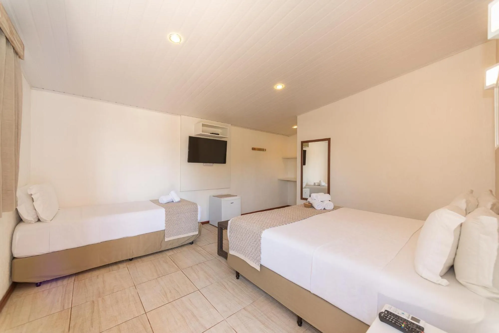 Bed in Pousada Malibu