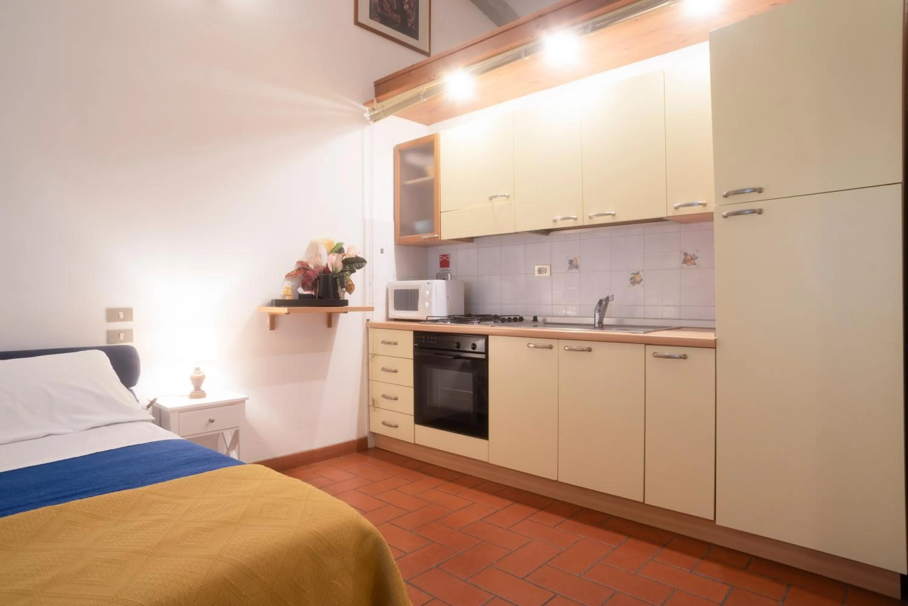 Kitchen or kitchenette, Bed in Hotel Residence La Contessina