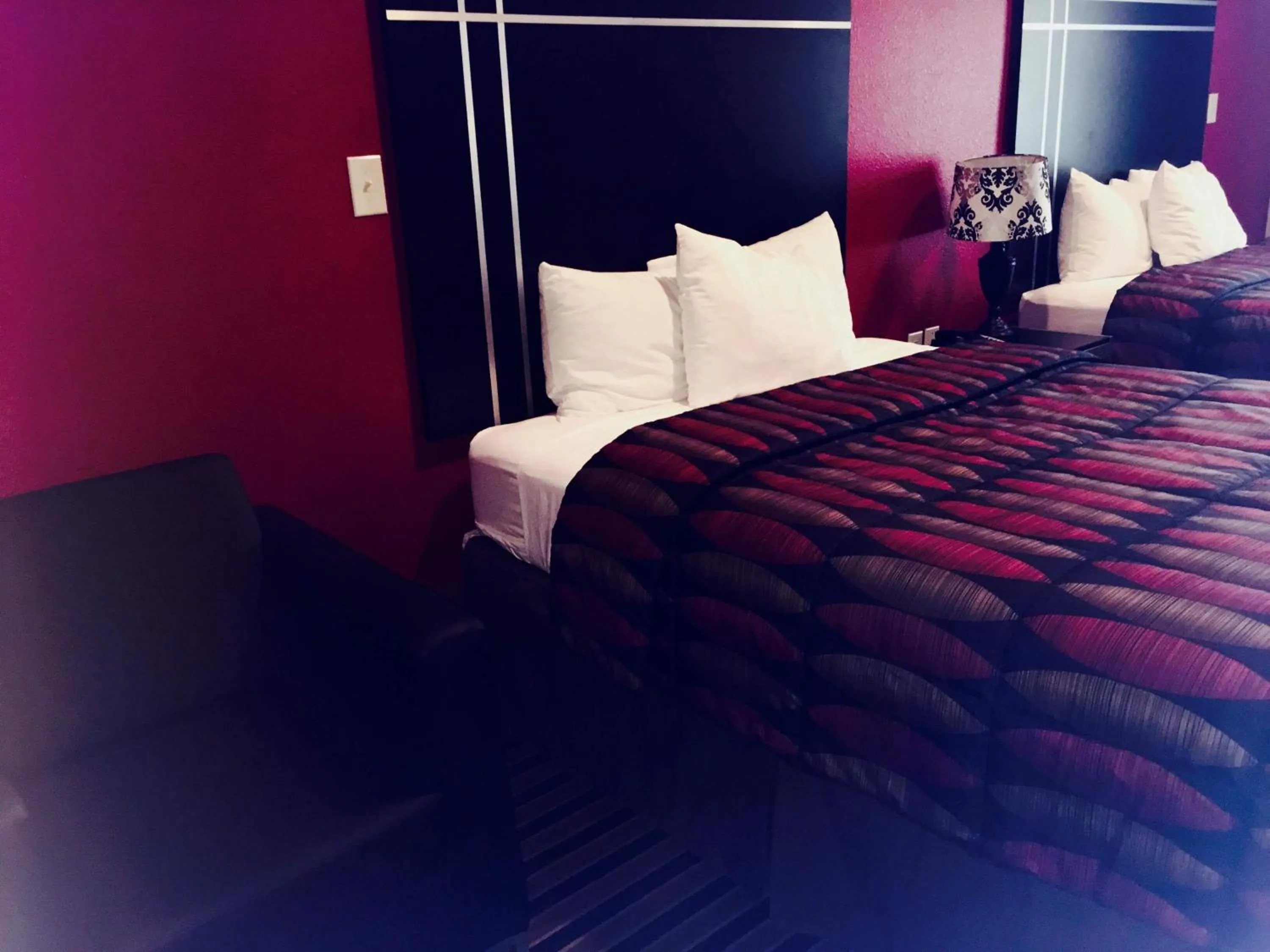 Bed in Texan Inn and Suites Tilden