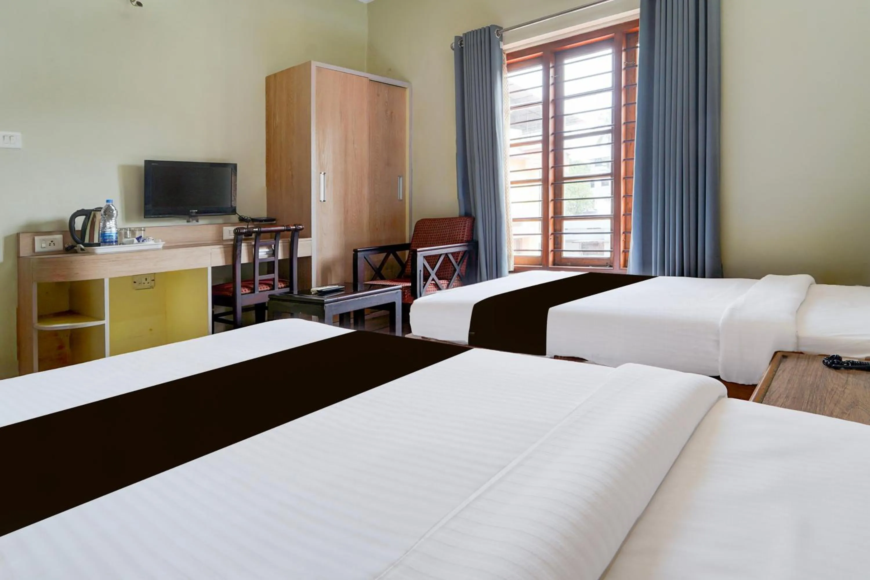 Bedroom, Bed in Super Townhouse MG Road Trivandrum Formerly Nandanam Park