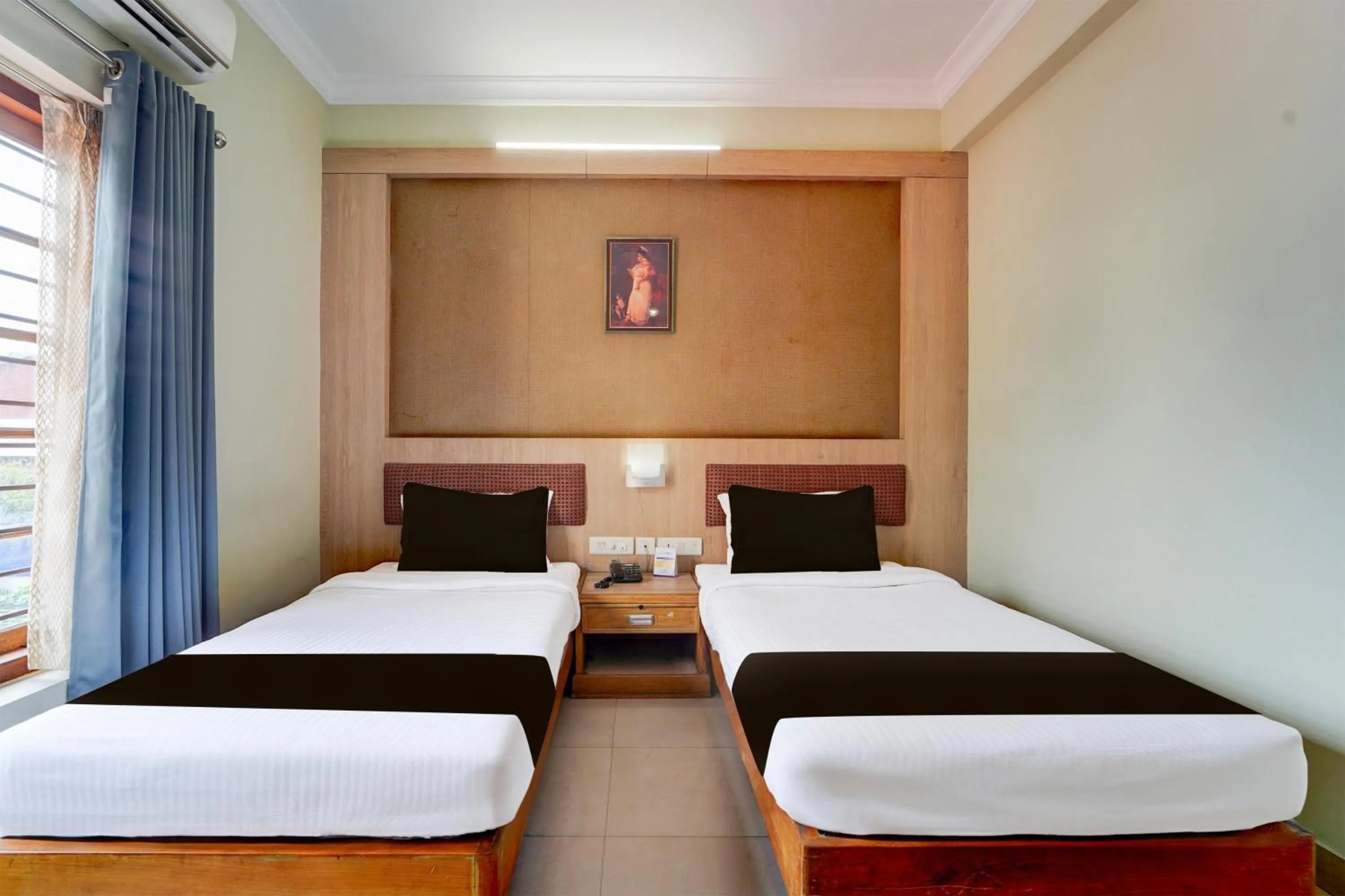 Bedroom, Bed in Super Townhouse MG Road Trivandrum Formerly Nandanam Park