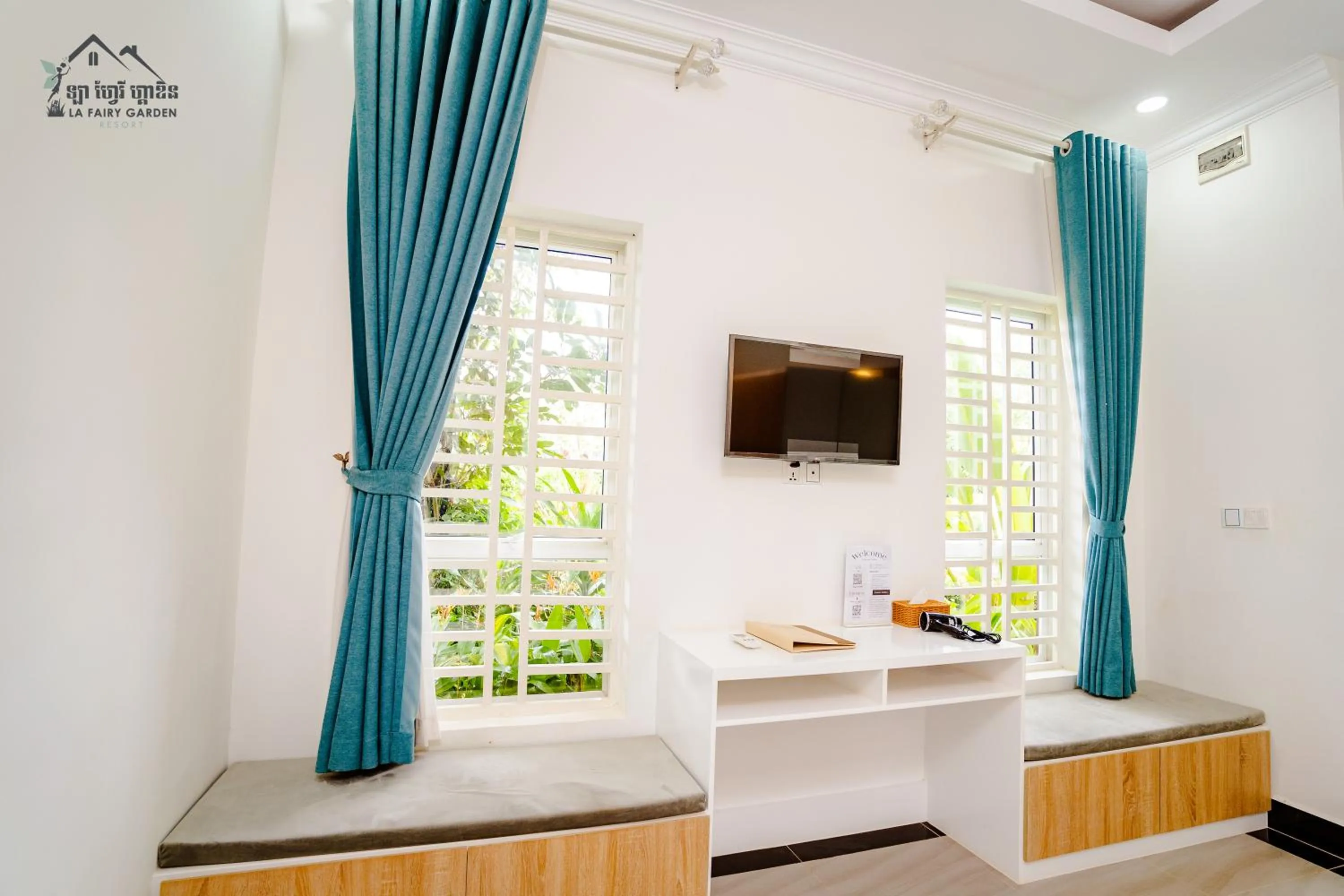 Communal lounge/ TV room in La Fairy Garden Resort