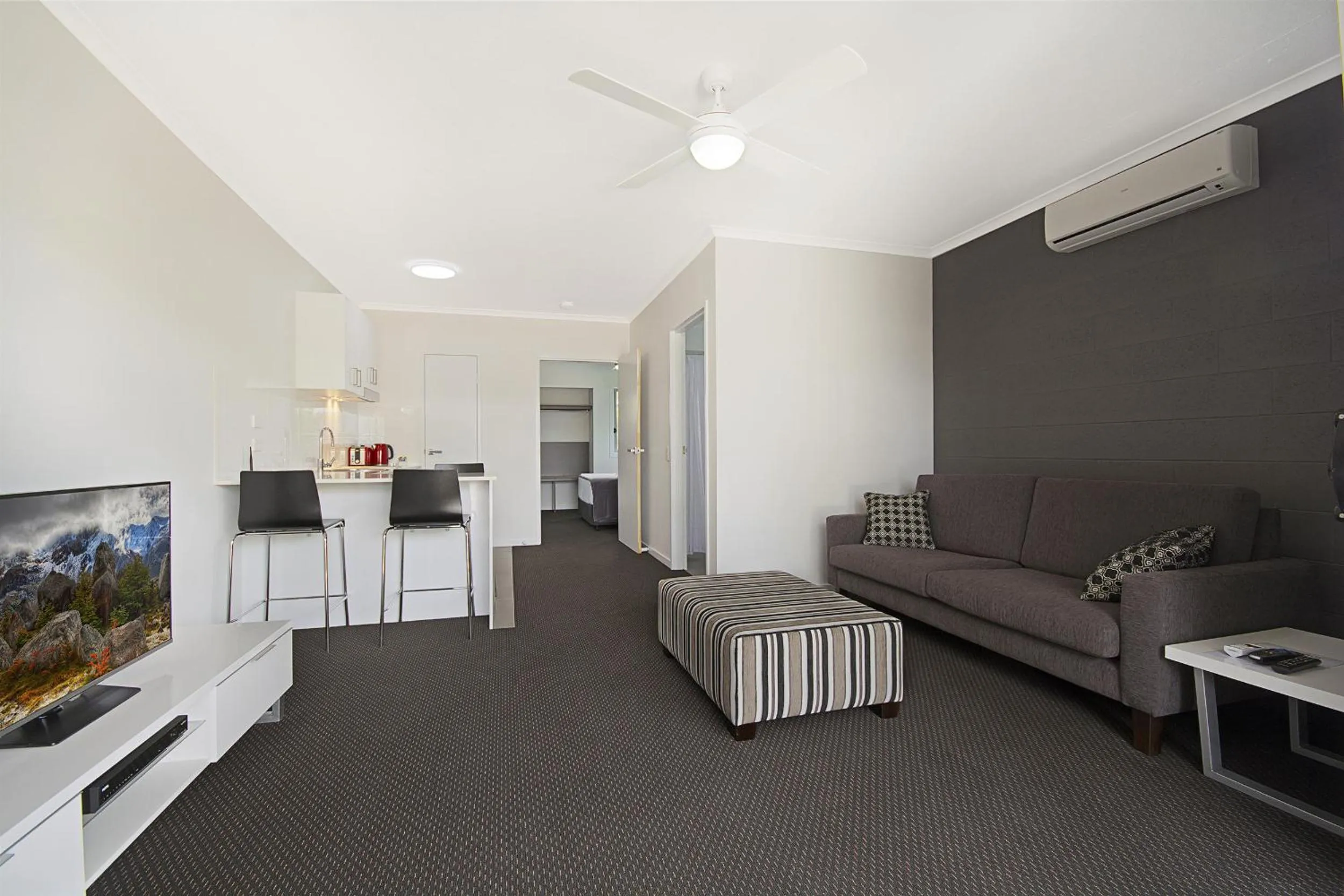Living room in Cooroy Luxury Motel Apartments