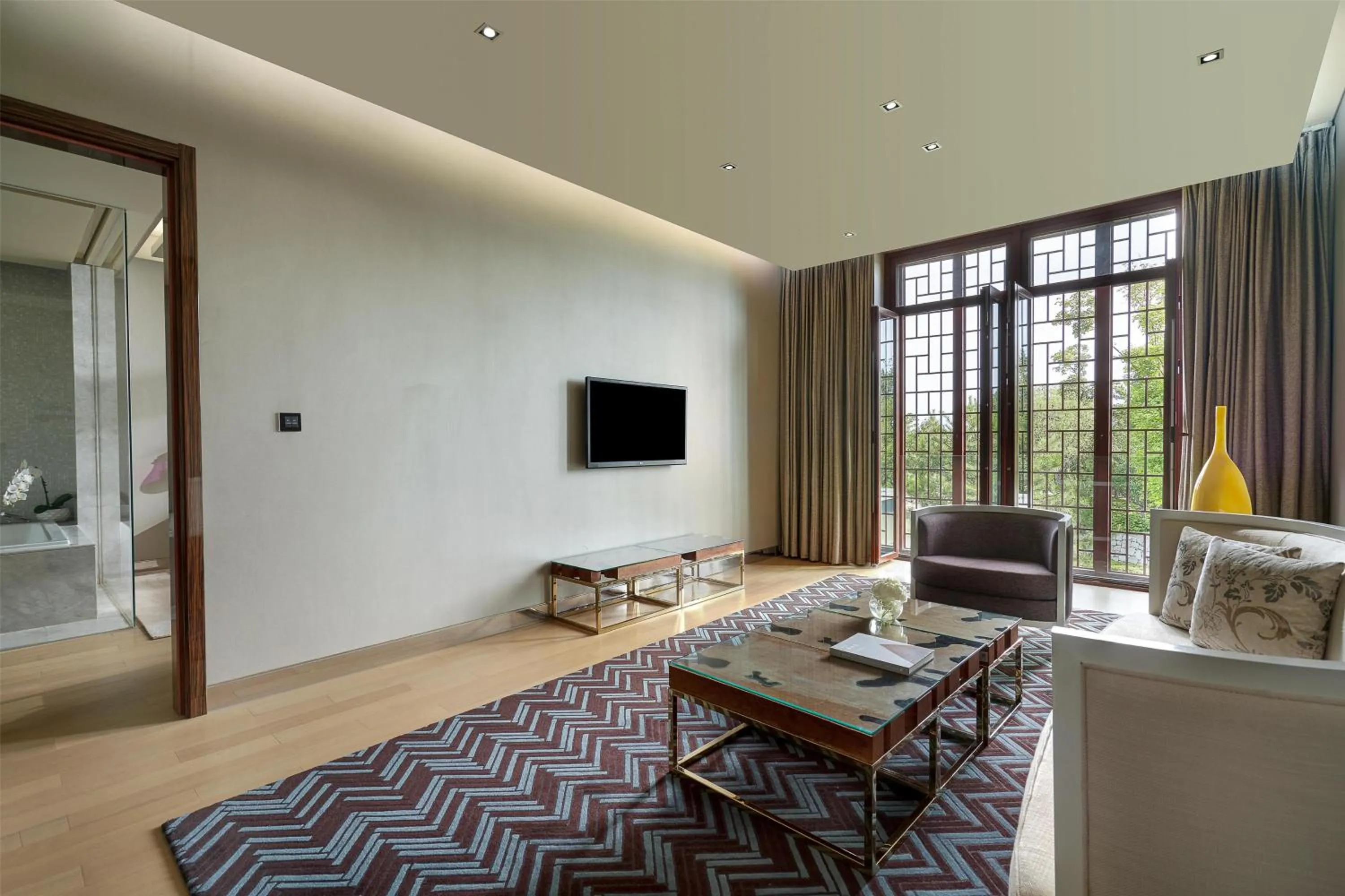 Living room in Yanqi Hotel, Managed by Kempinski