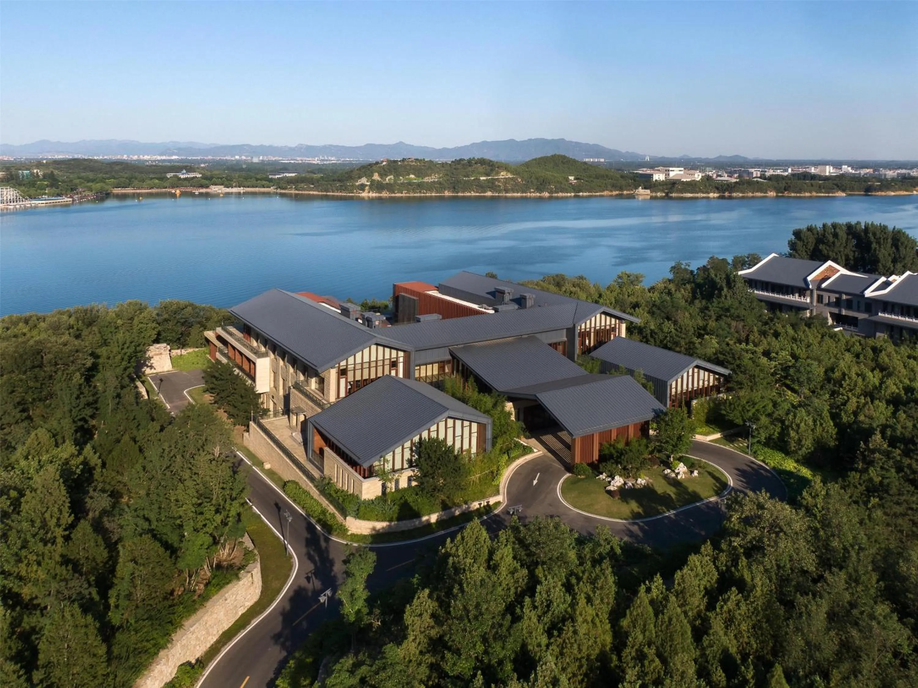 Property building in Yanqi Hotel, Managed by Kempinski