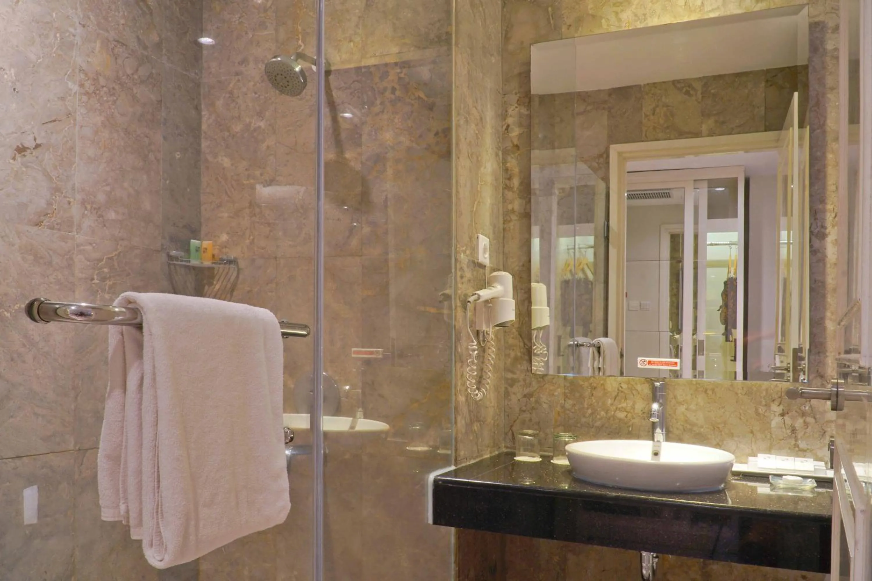 Bathroom in Swiss-Belhotel Lampung