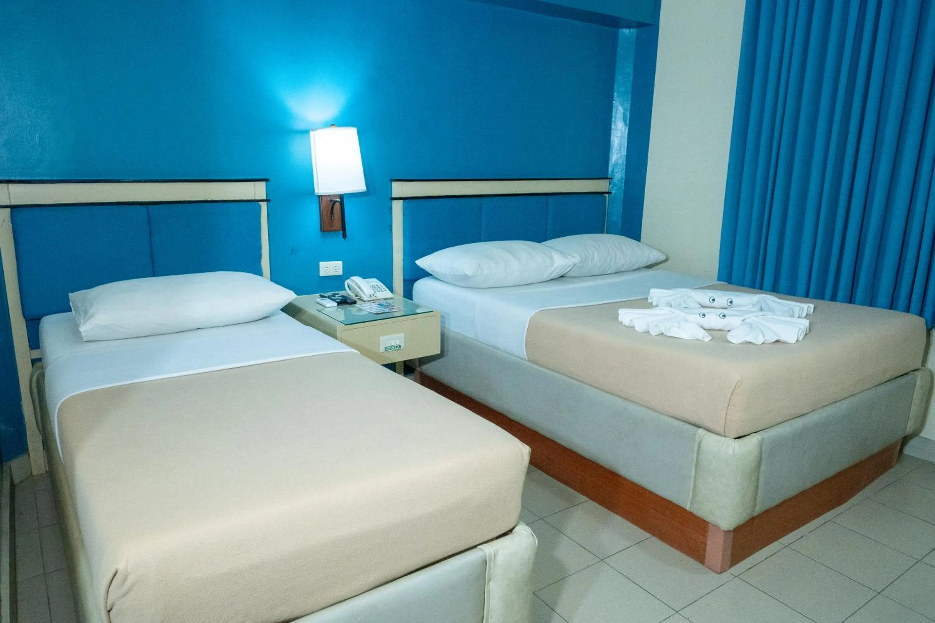 Bed in New Dawn Pensionne House